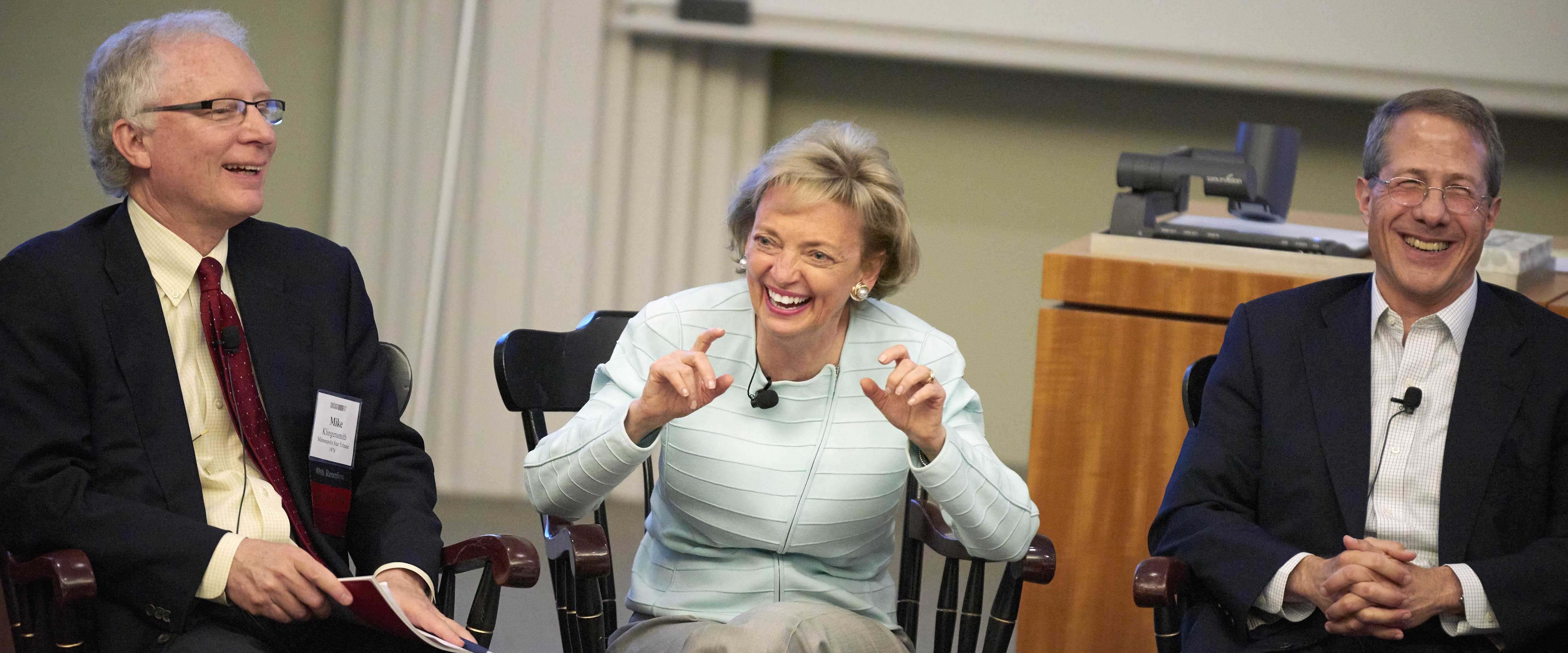 Michael Klingensmith, Mary Lou Gorno, and Andrew Alper smile and laugh while seated during a panel discussion