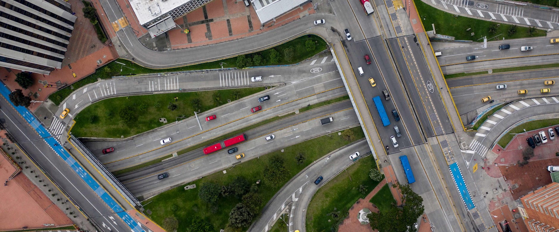 Aerial view of Bogota Colombia showing busses and cars on streets and highways