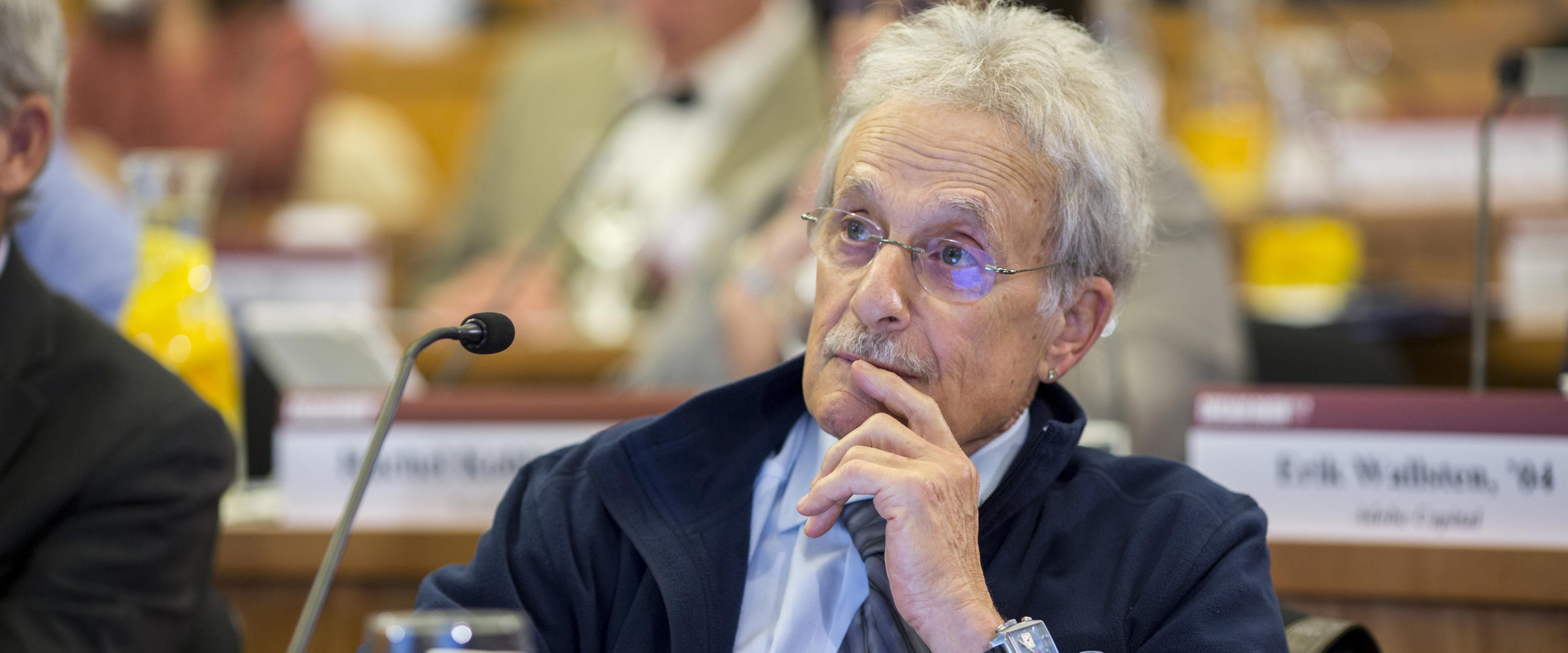 Ron Tarrson looking up while listening to a presentation