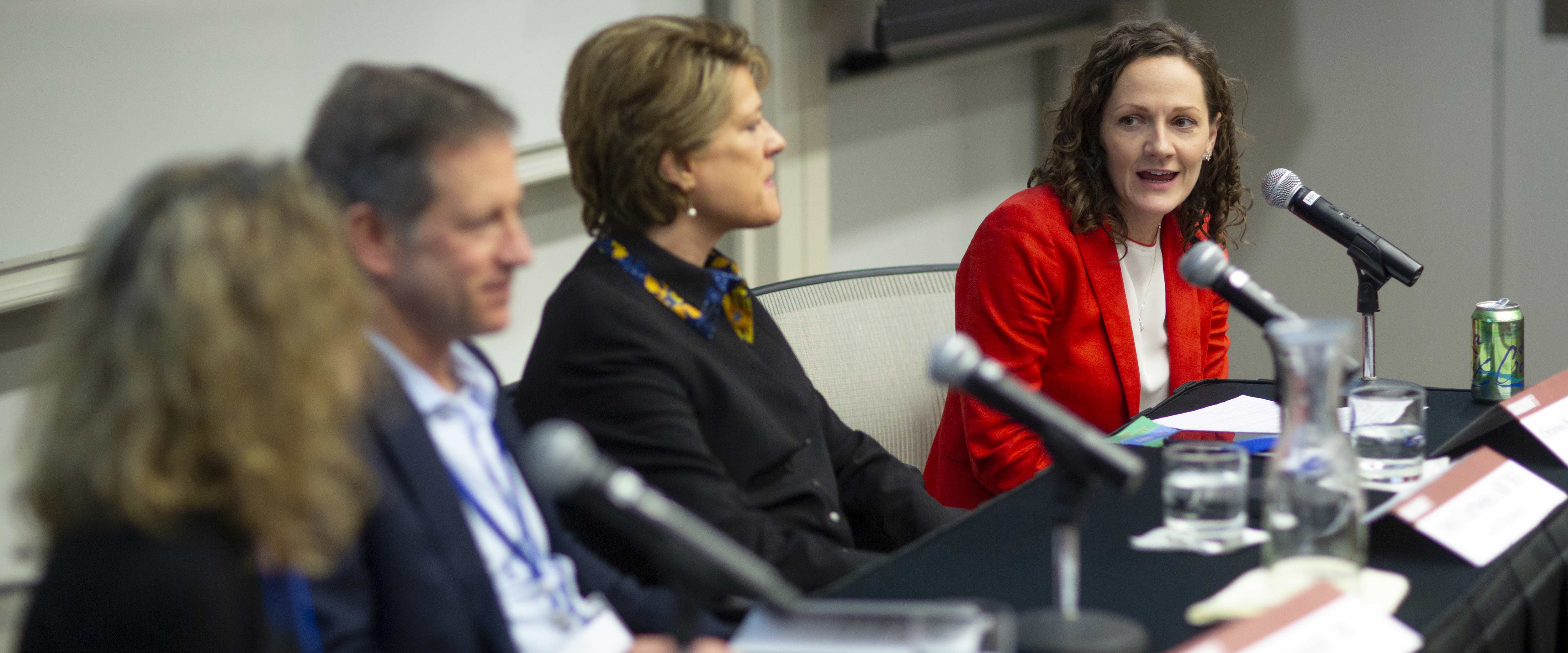 Christina Hachikian speaking on a panel with colleagues