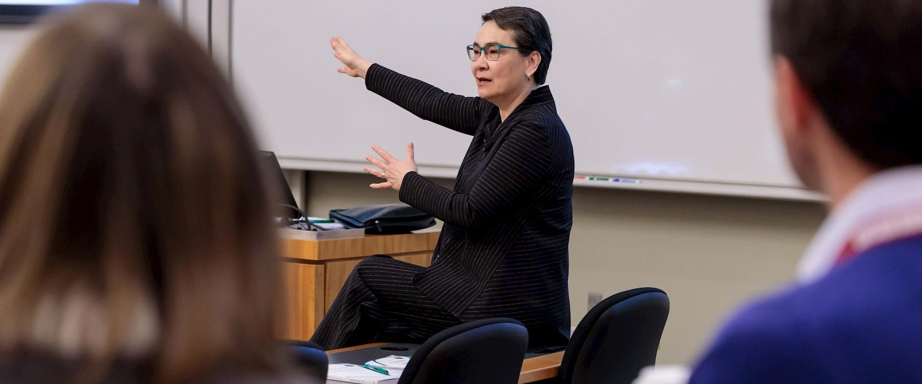 Professor Linda Ginzel teaches to a classroom during Reconnect 2019