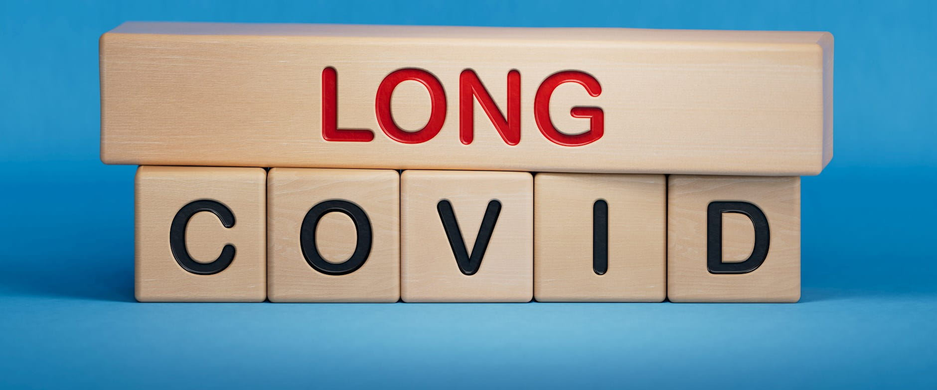 Long Covid spelled out on wooden blocks