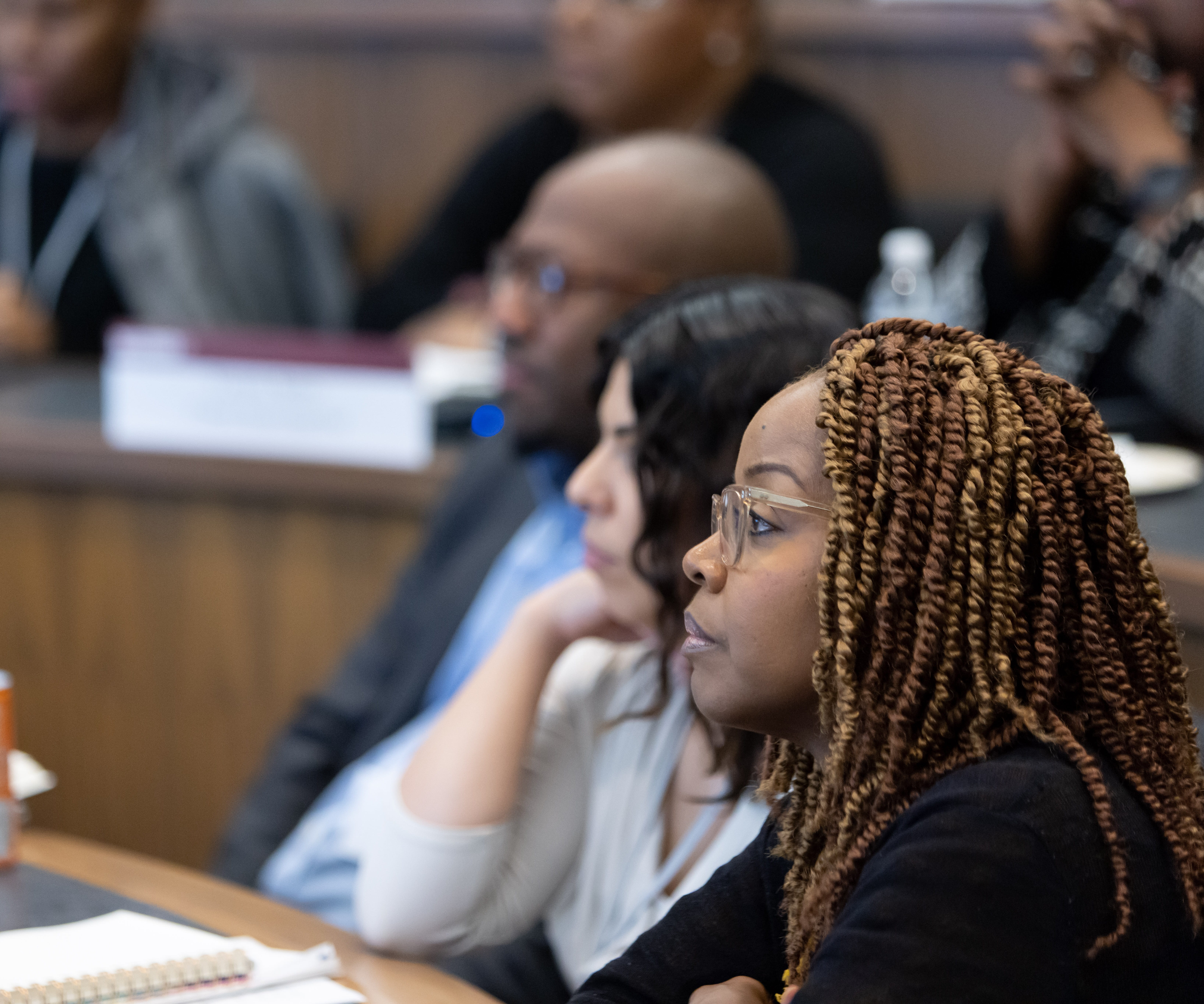 Participants of IGNITE looking onward and engaged