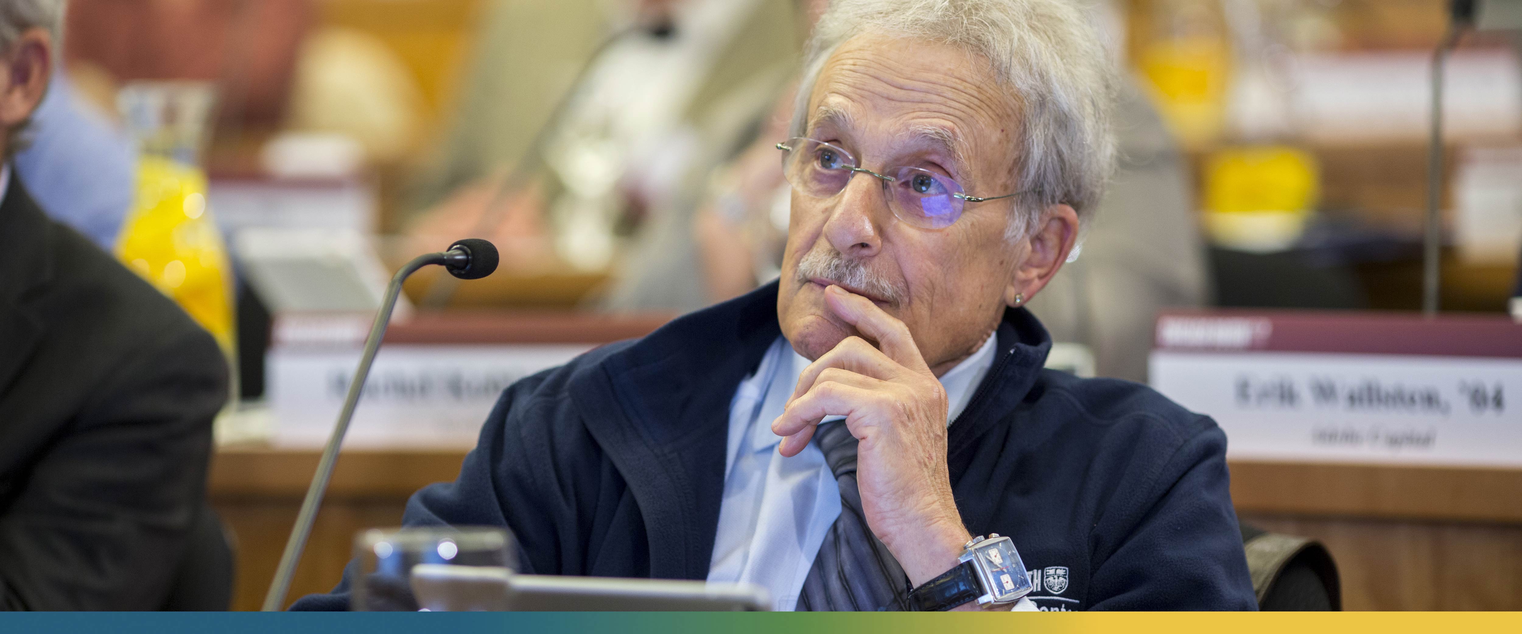 Ron Tarrson listening to a presentation