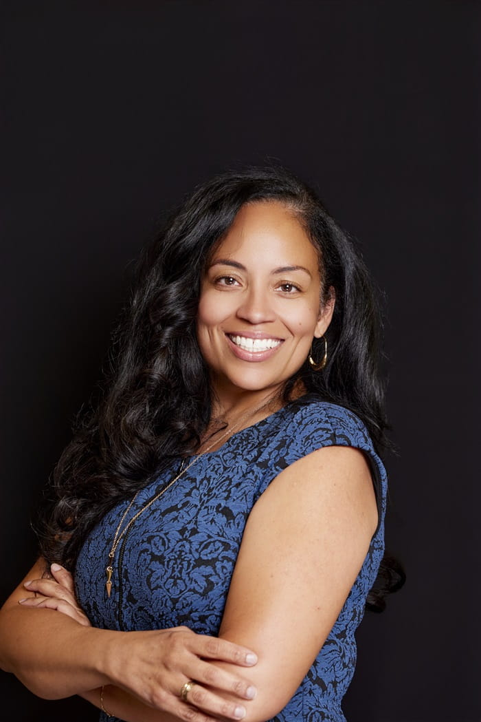 A headshot of Kia Coleman