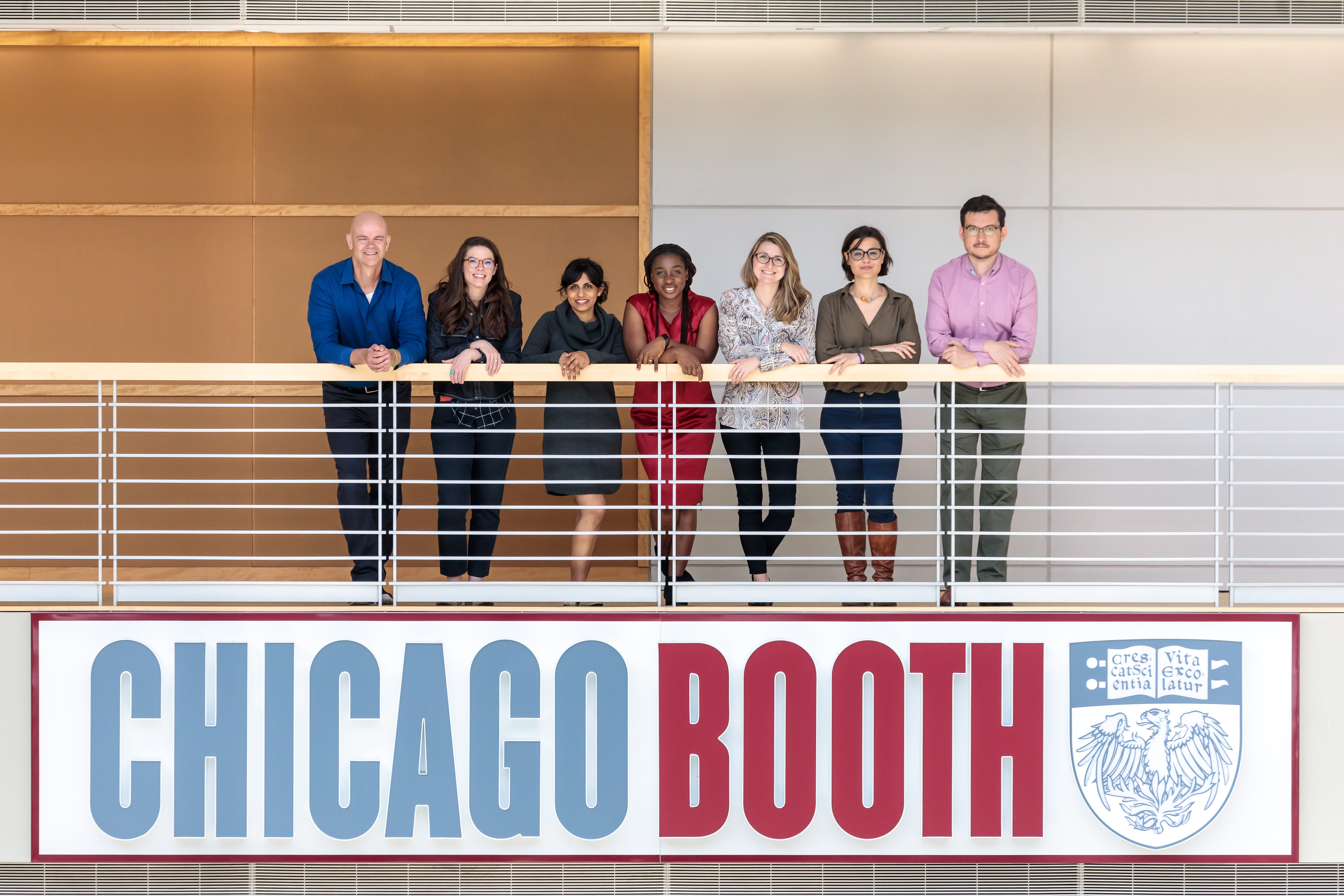Journalists in Residence near Booth sign in Harper Center