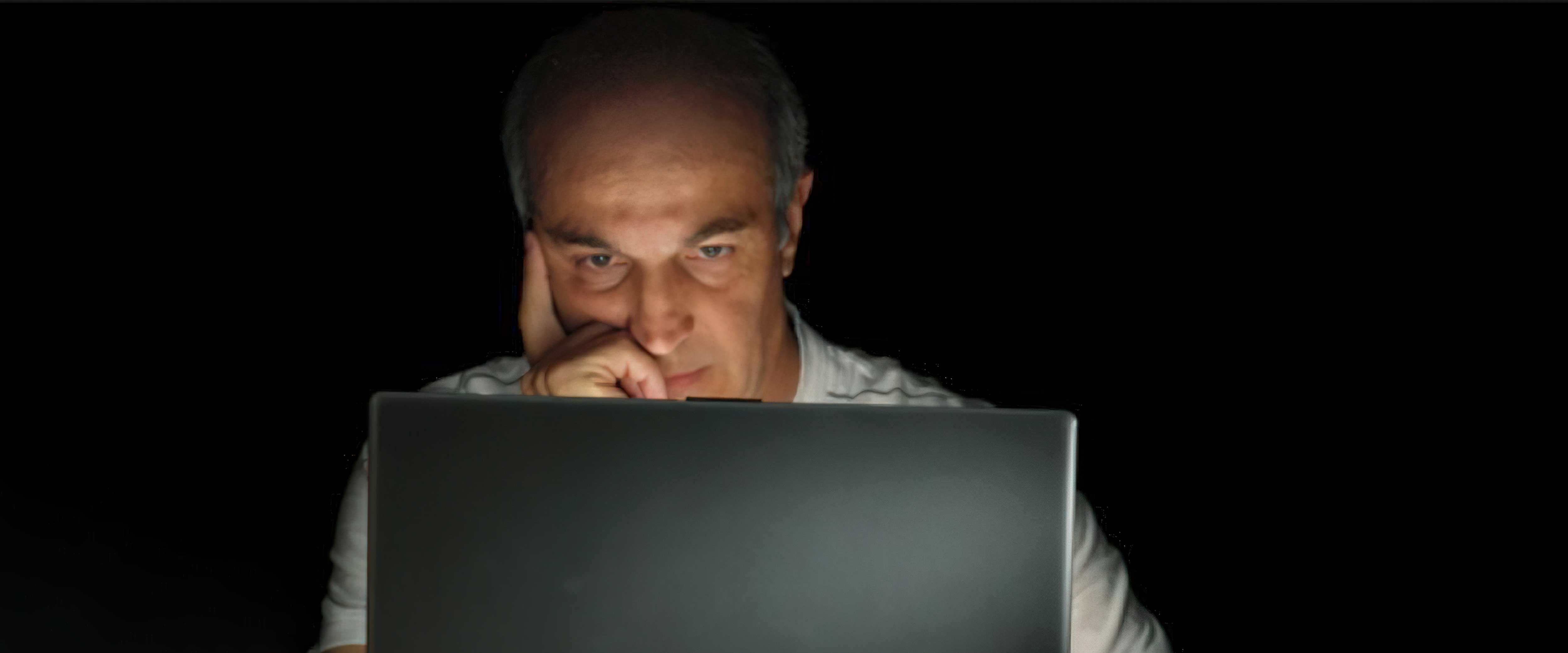 Man looking at laptop