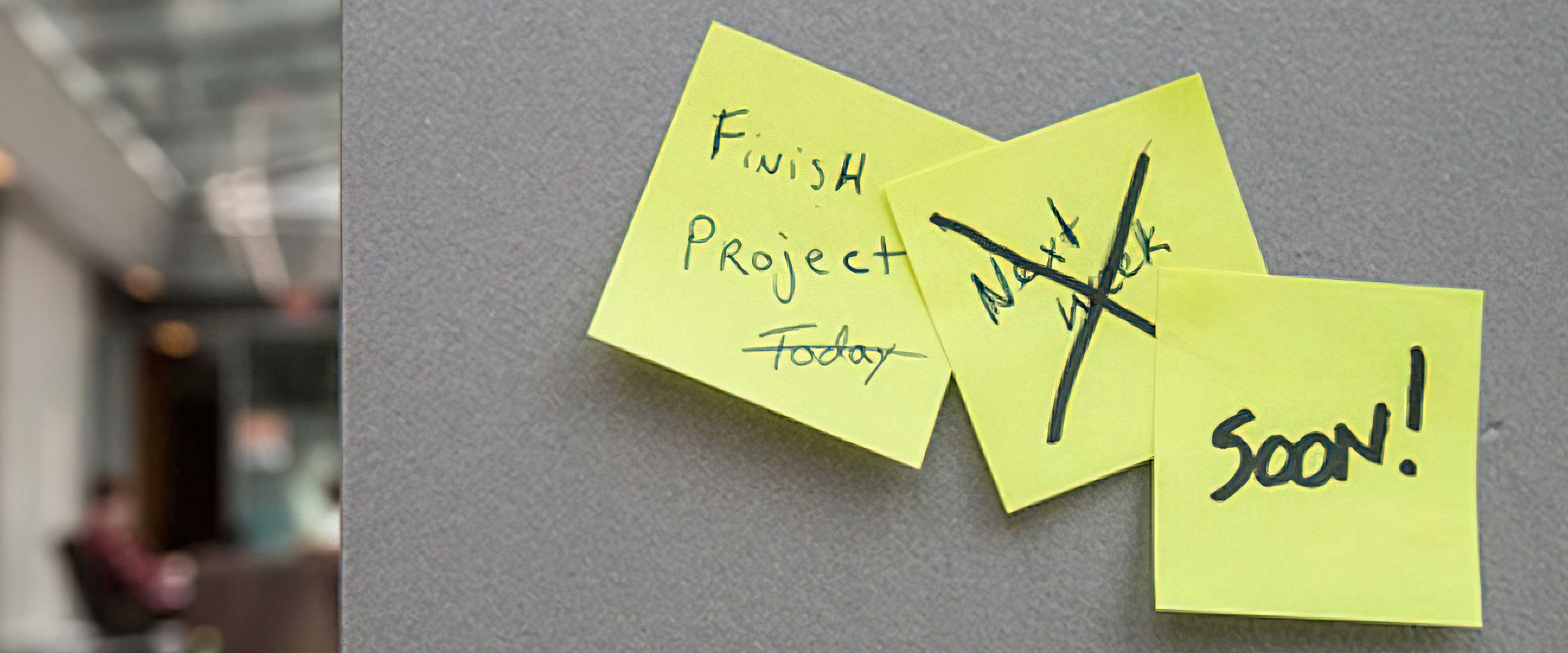 Post-it notes depicting a pushed deadline