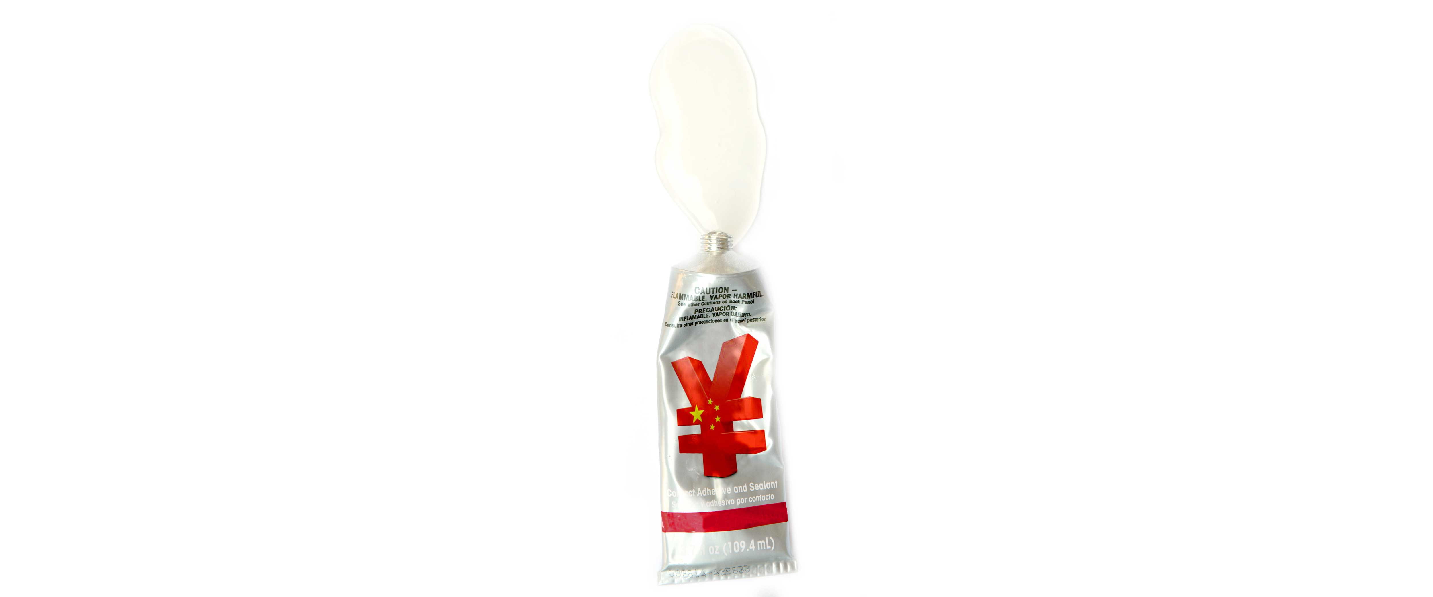 Tube of glue with Yen on it