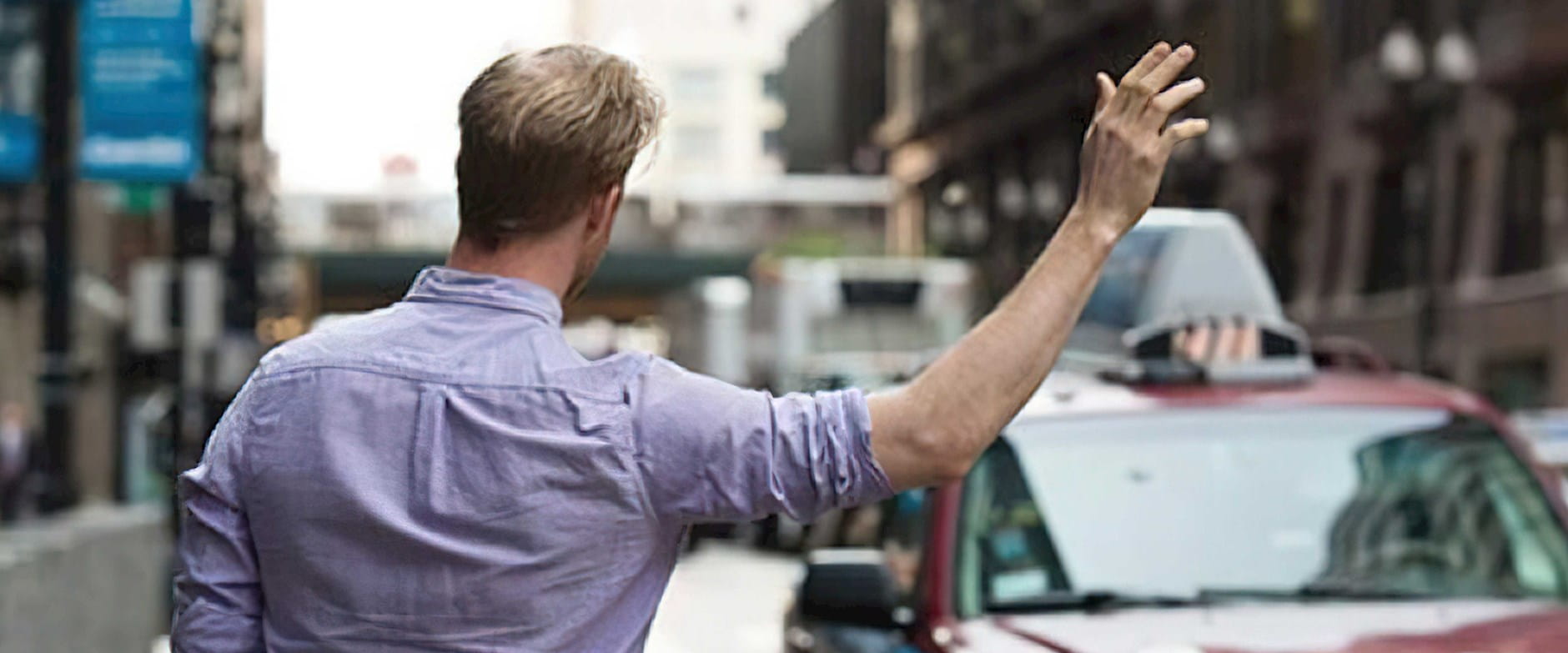 Man waving down cab