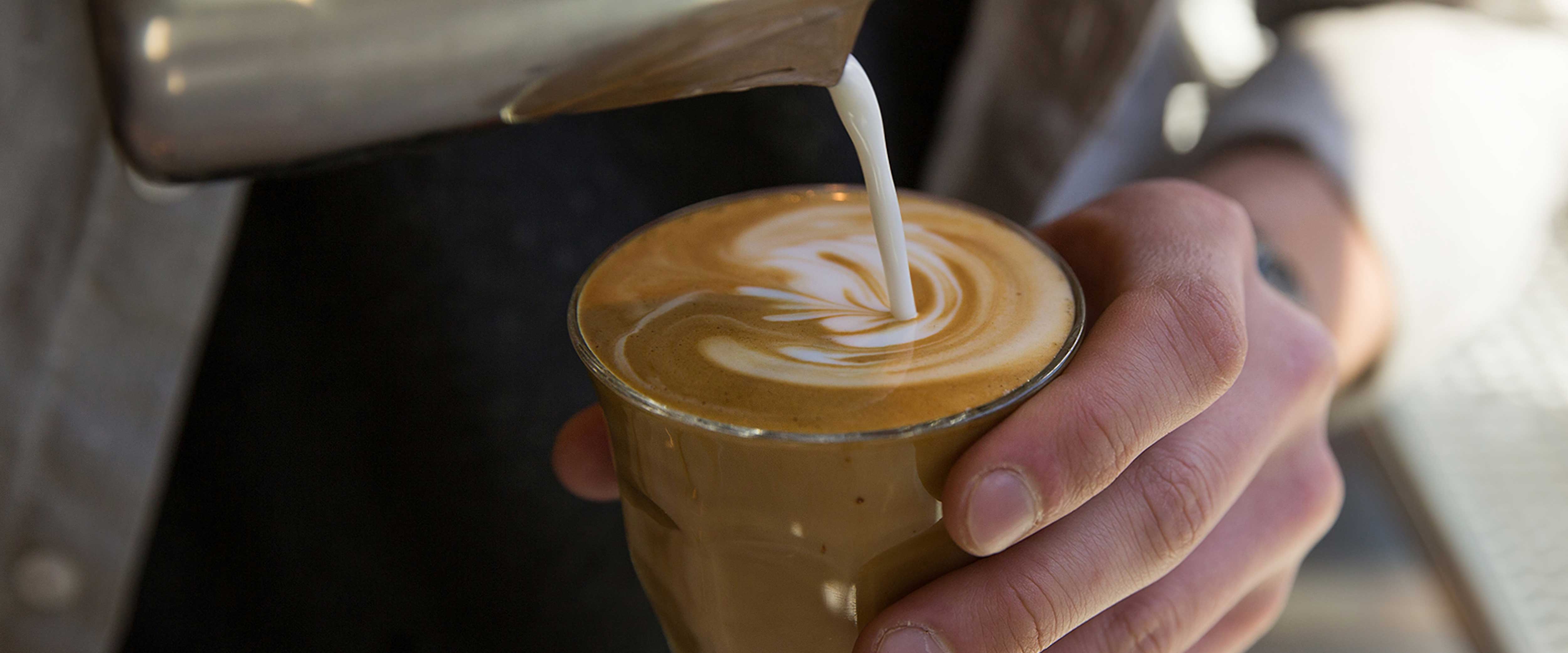 Latte being poured