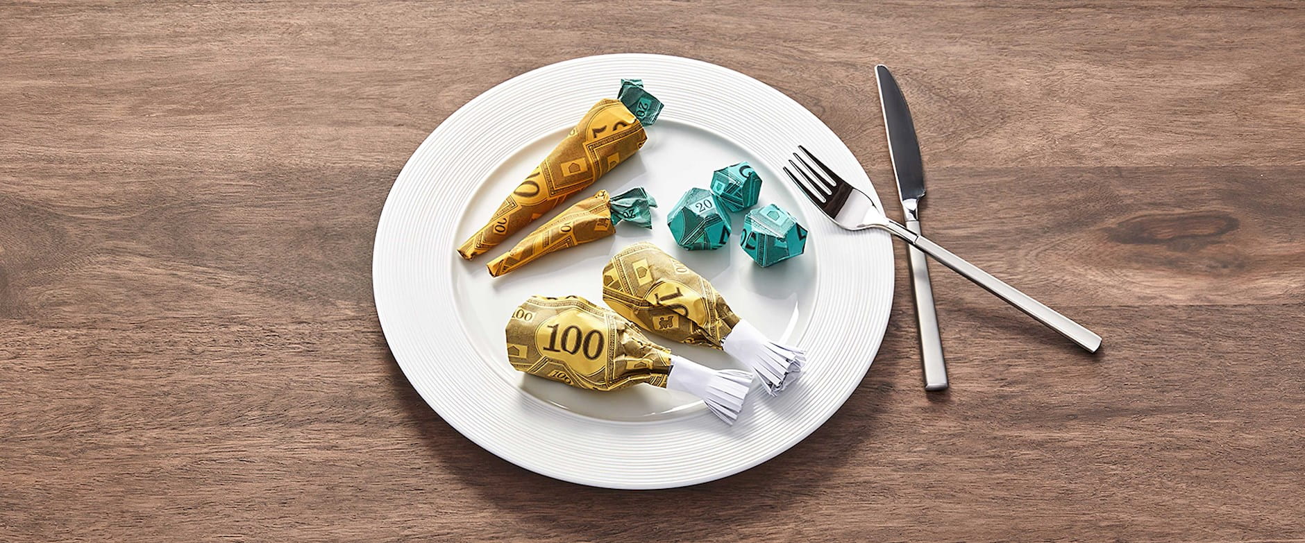 Dinner plate with food made of money
