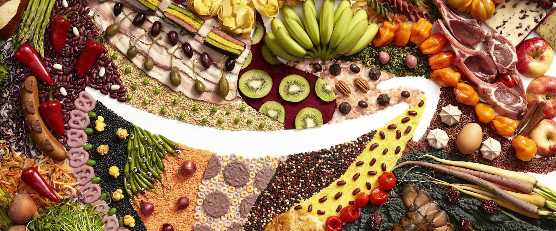 An array of food with an Amazon smile in the middle of it