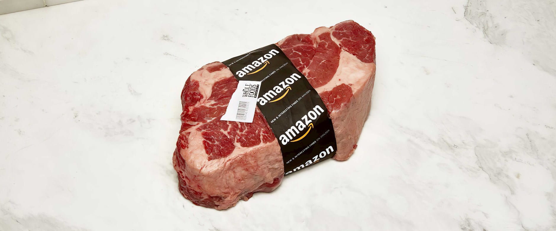 Large steak with Amazon shipping wrap on it