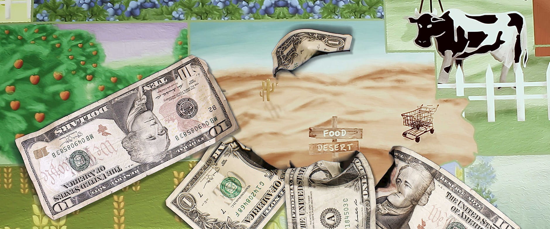 Dollars and a cow around sand