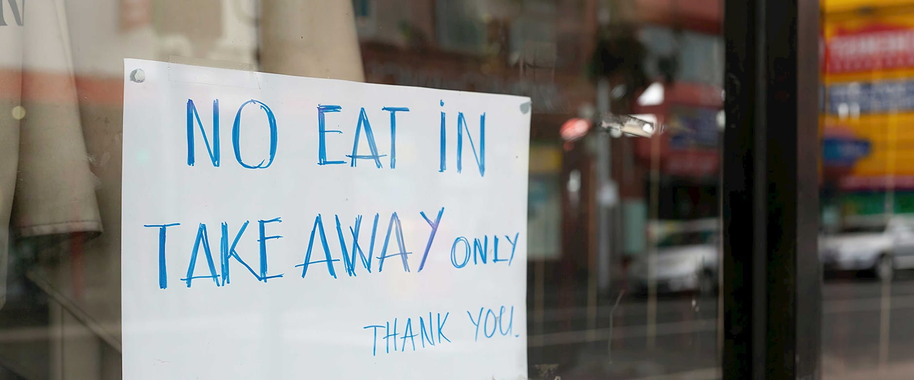 Sign that says "No eat in take away only. Thank you"