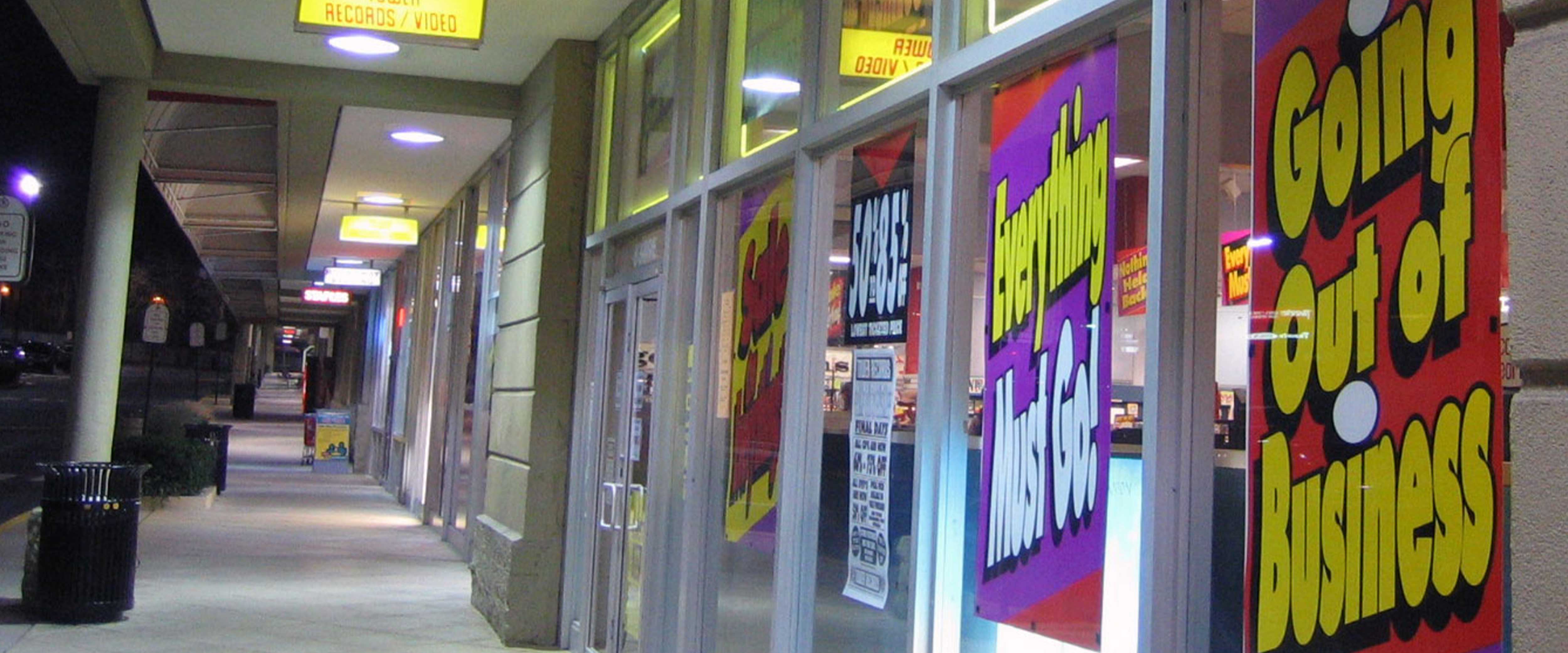 Store with "going out of business" signs