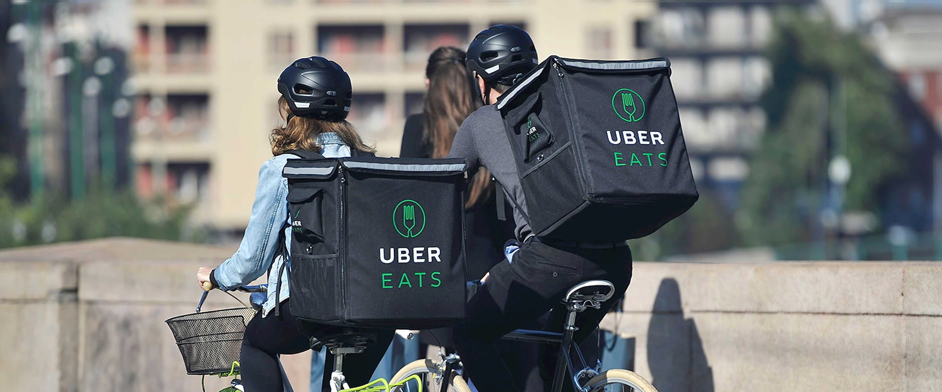 Uber eats delivery people on bikes
