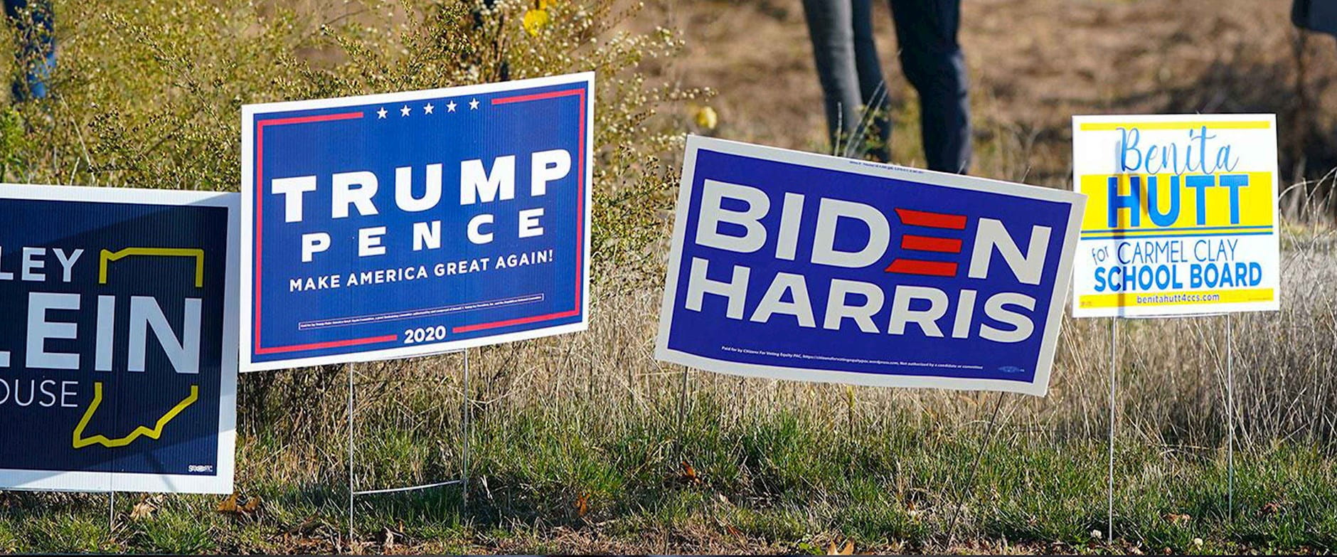 2020 election signs in the grass