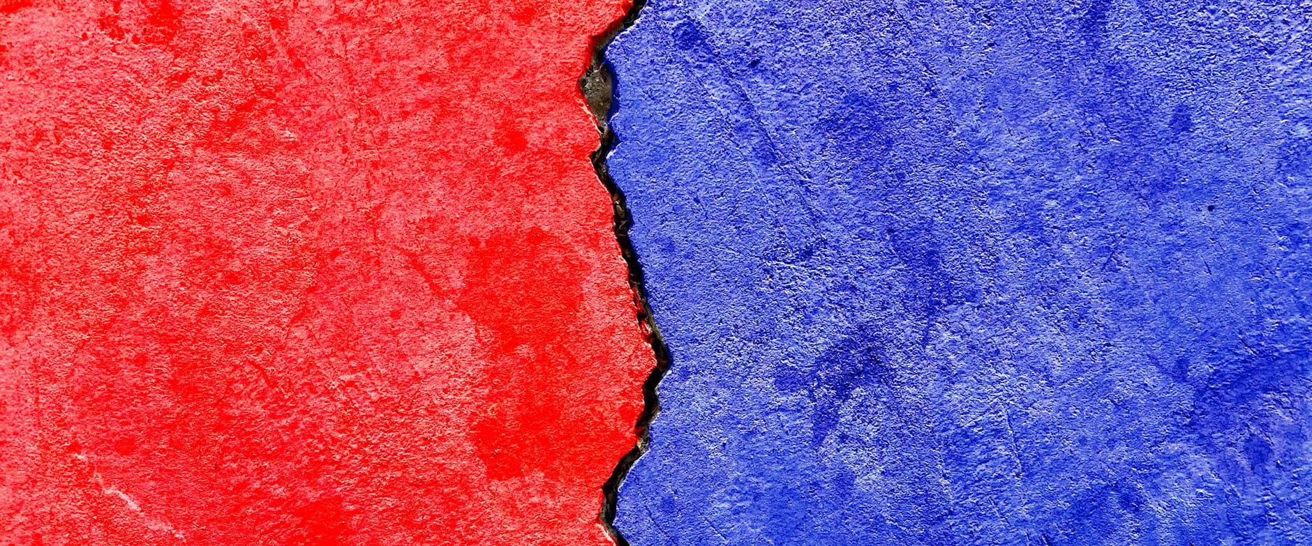 A fracture dividing red and blue surfaces