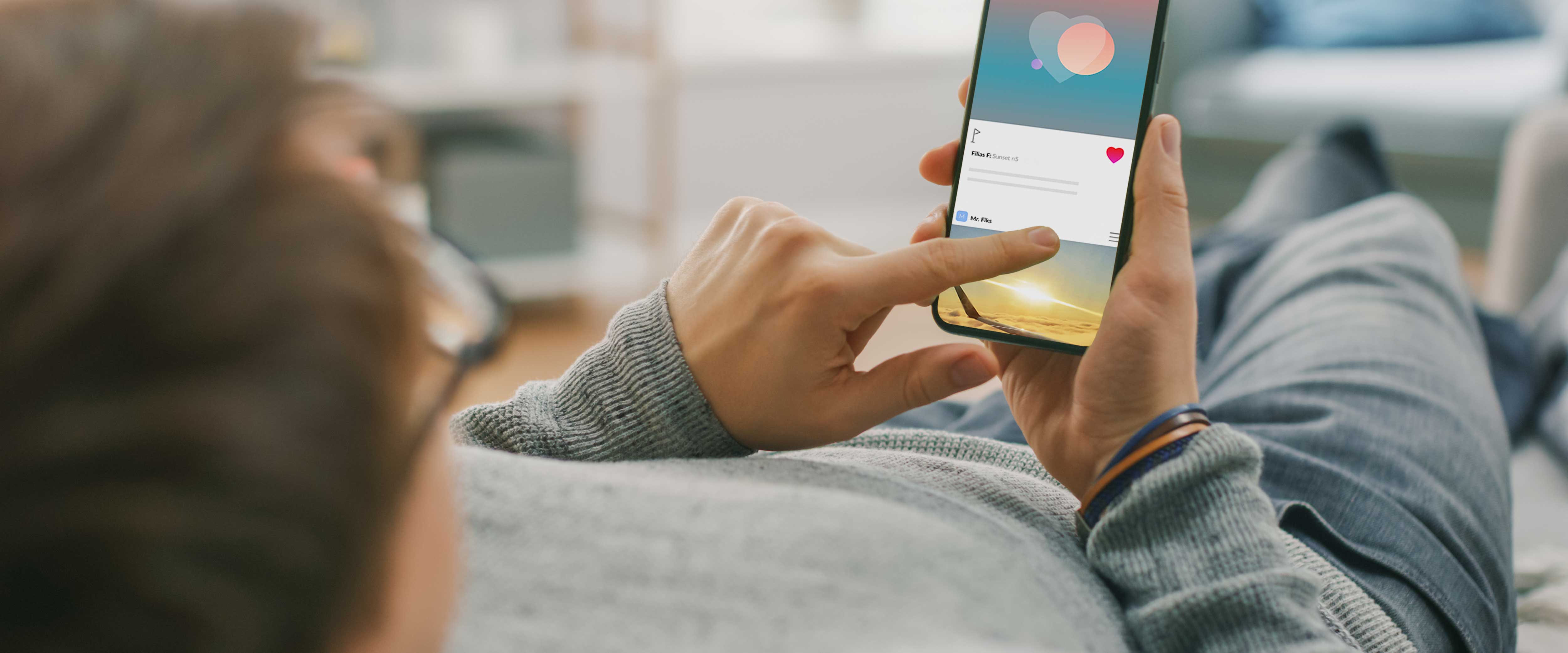 Person scrolling on smartphone