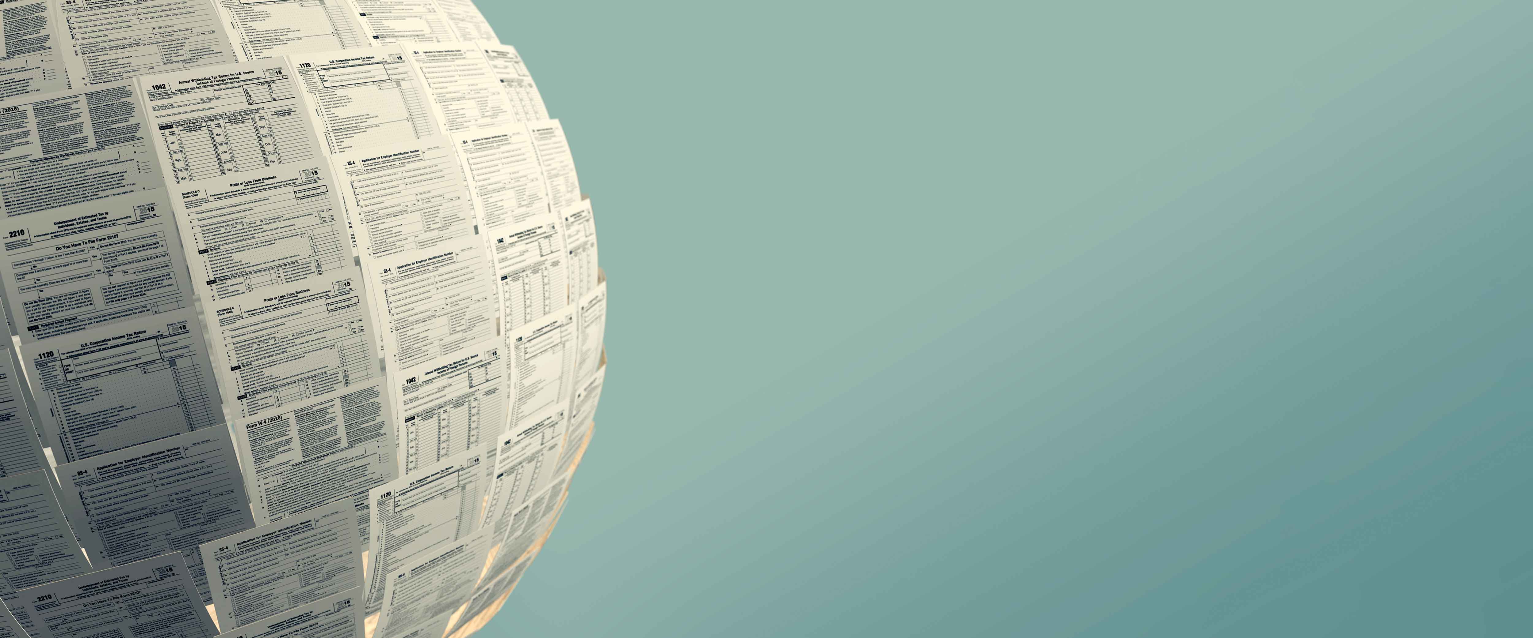 Globe made of tax forms