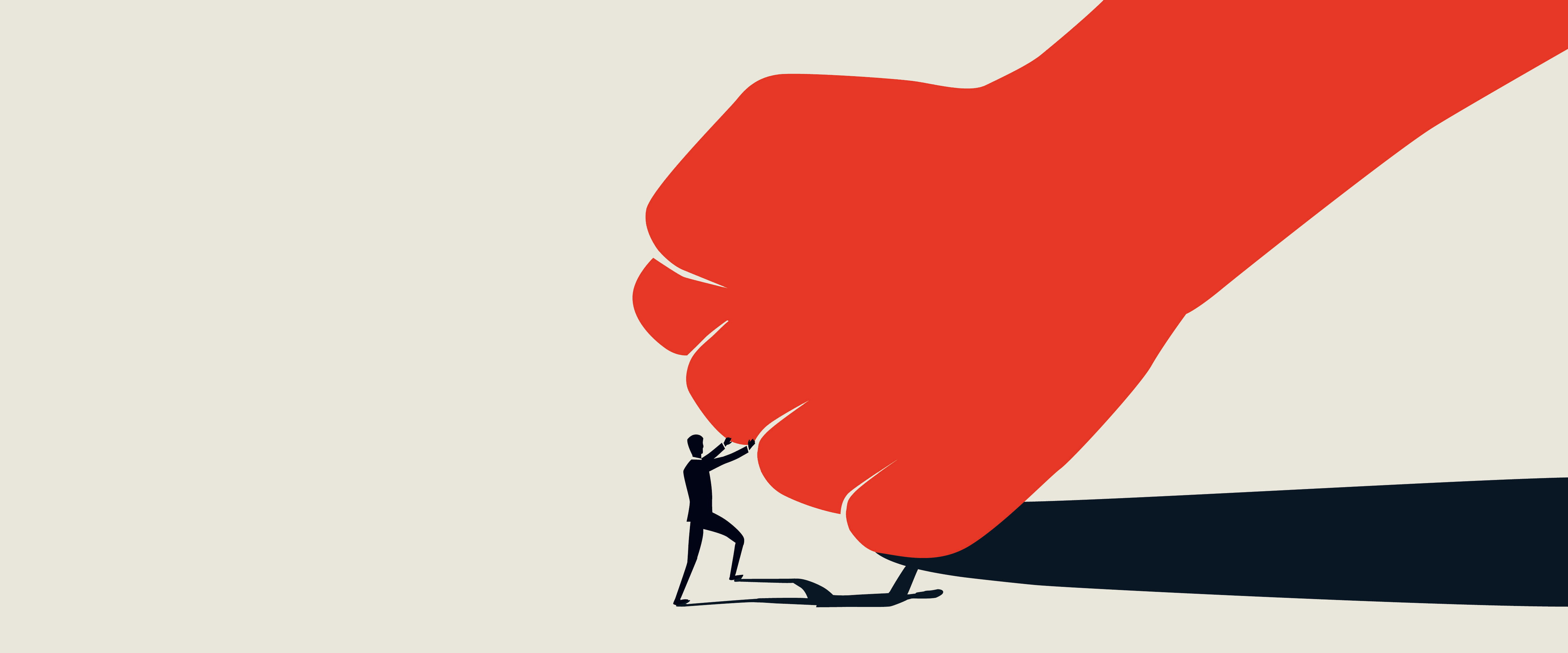 Man pushing giant fist