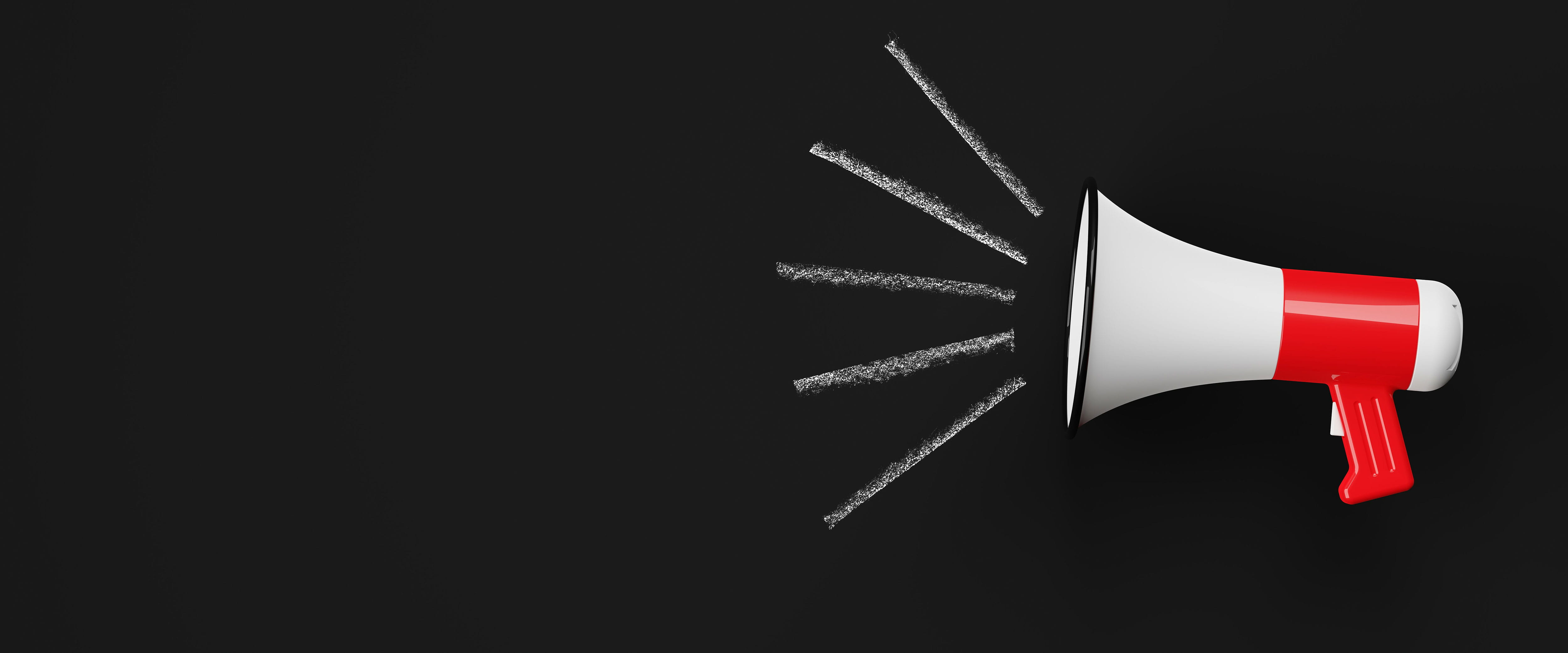 Megaphone against a chalkboard