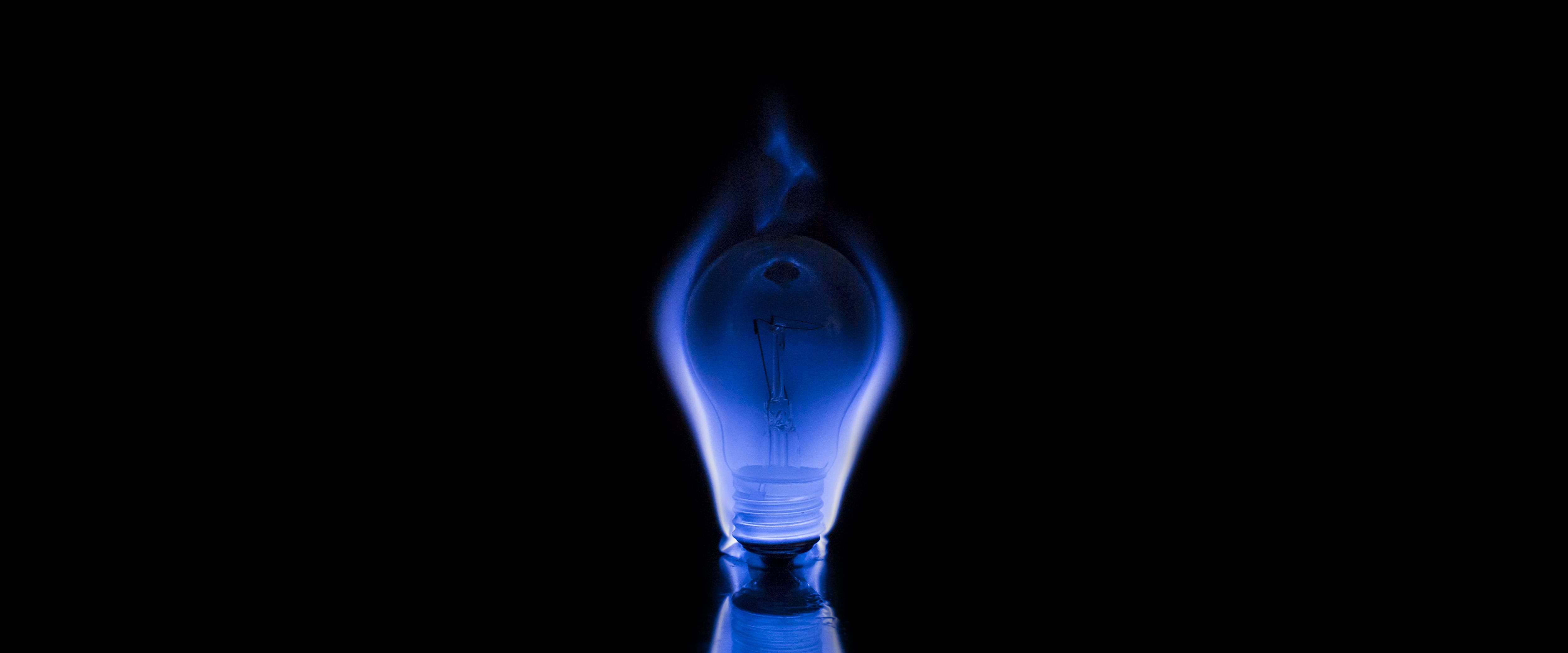 Blue flame around lightbulb