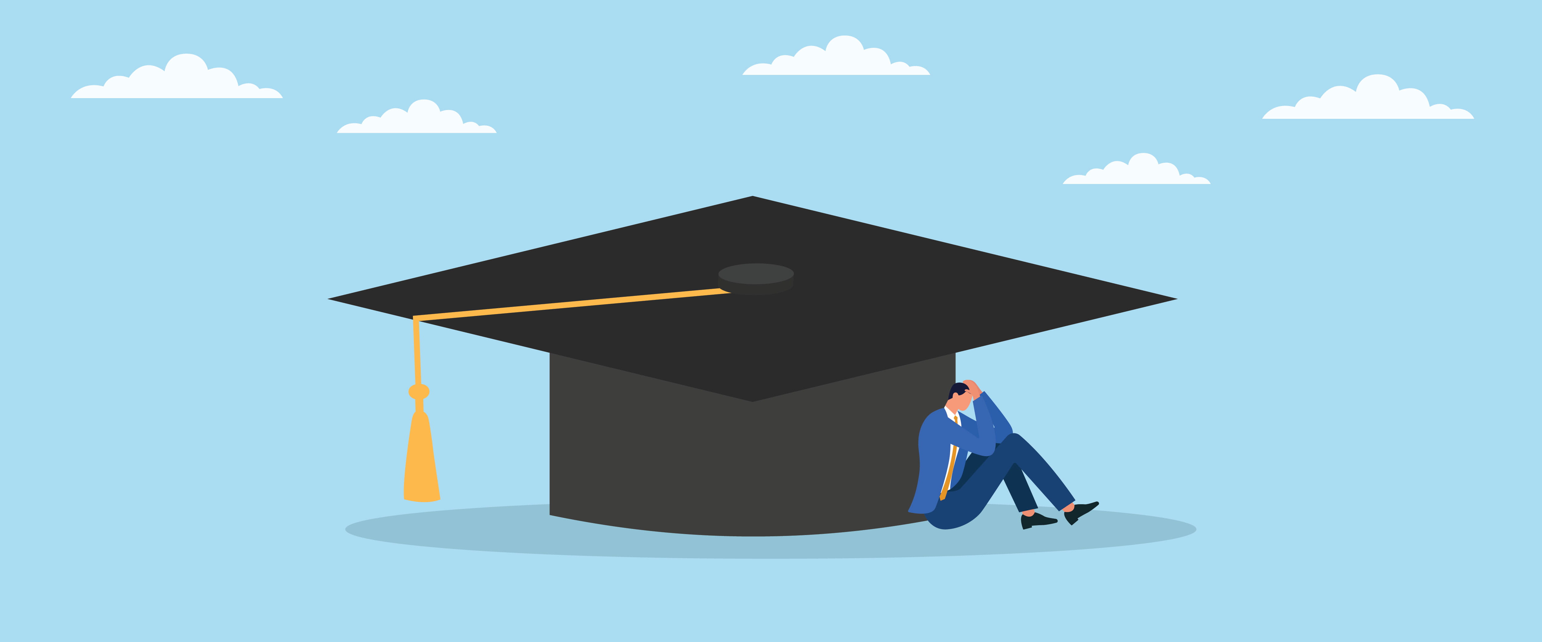 Sad person sitting under graduate cap