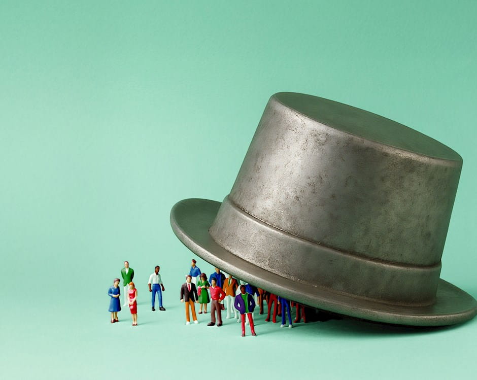 People under Monopoly top hat