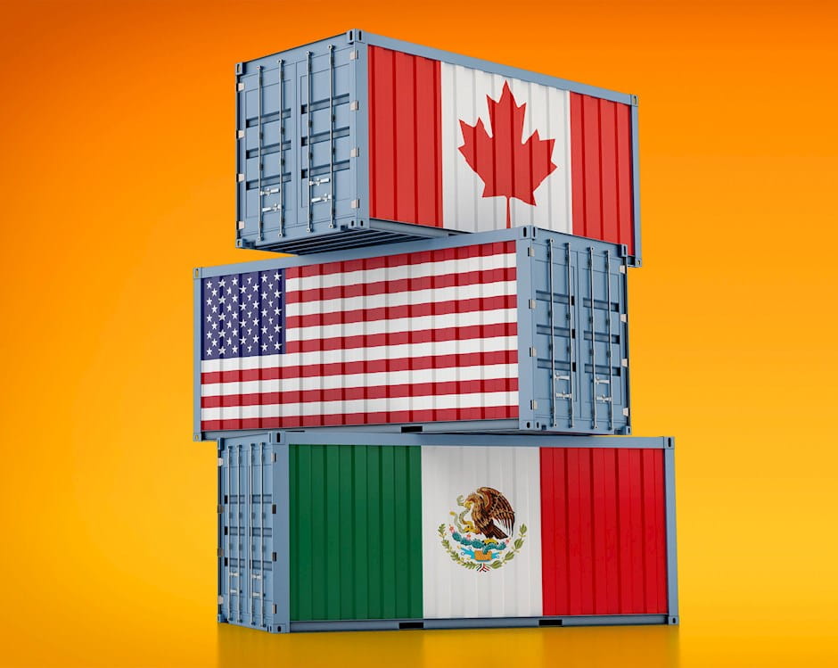 Shipping containers with the flags of Canada, the US, and Mexico
