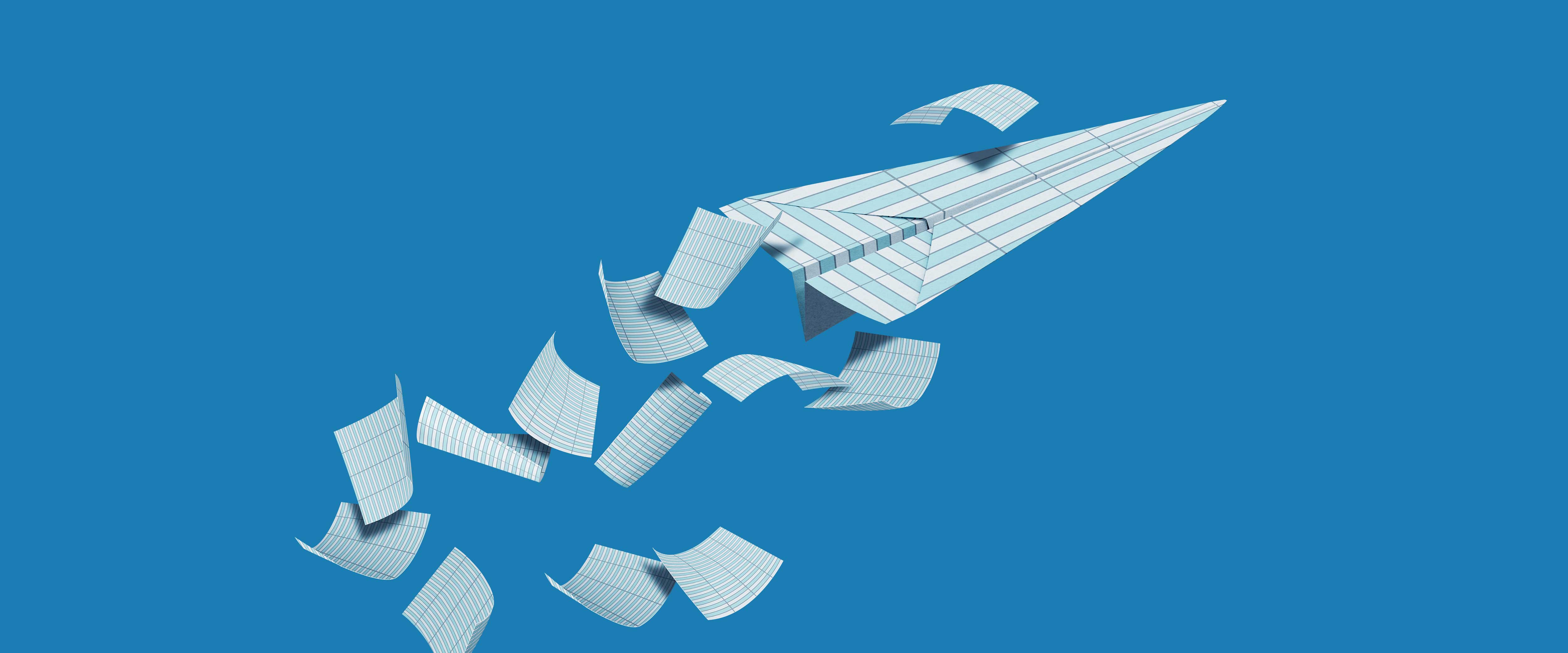 Paper airplane made from accounting ledger
