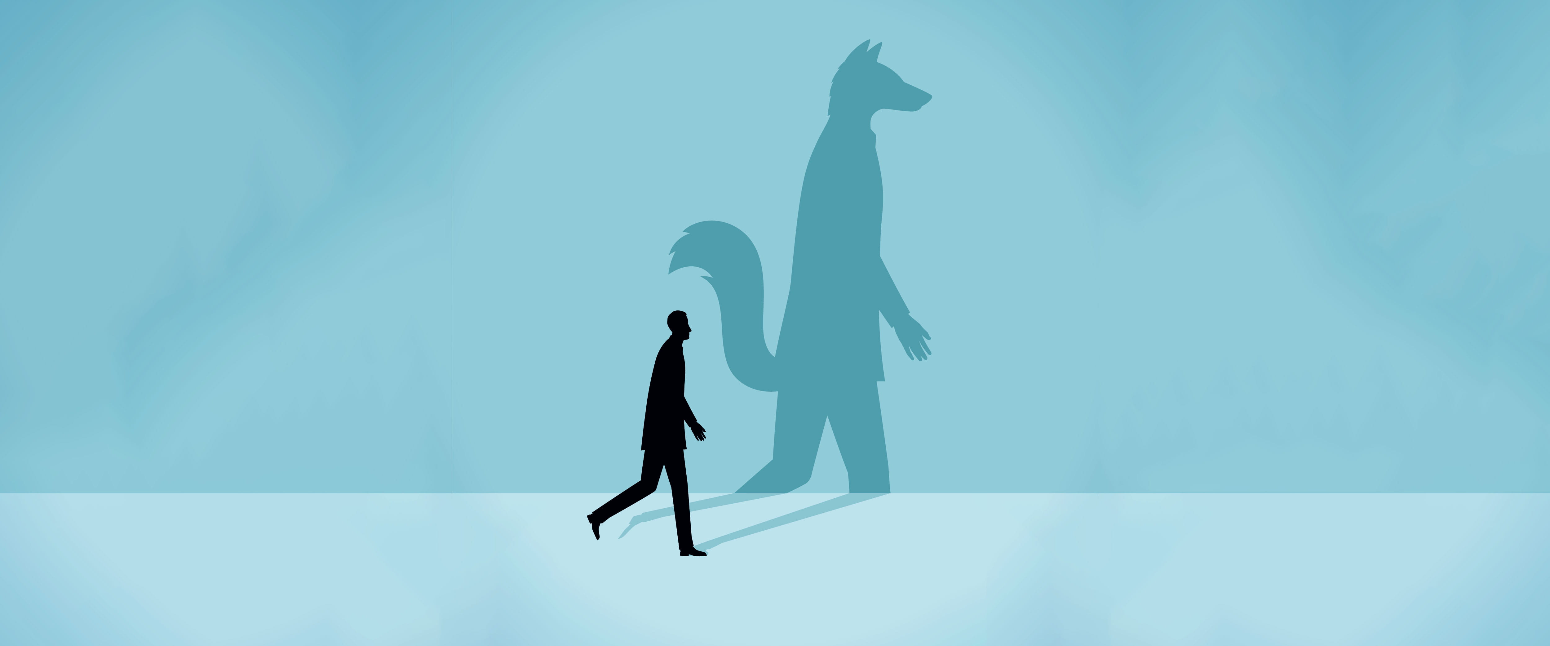 Man casting the shadow of a wolf