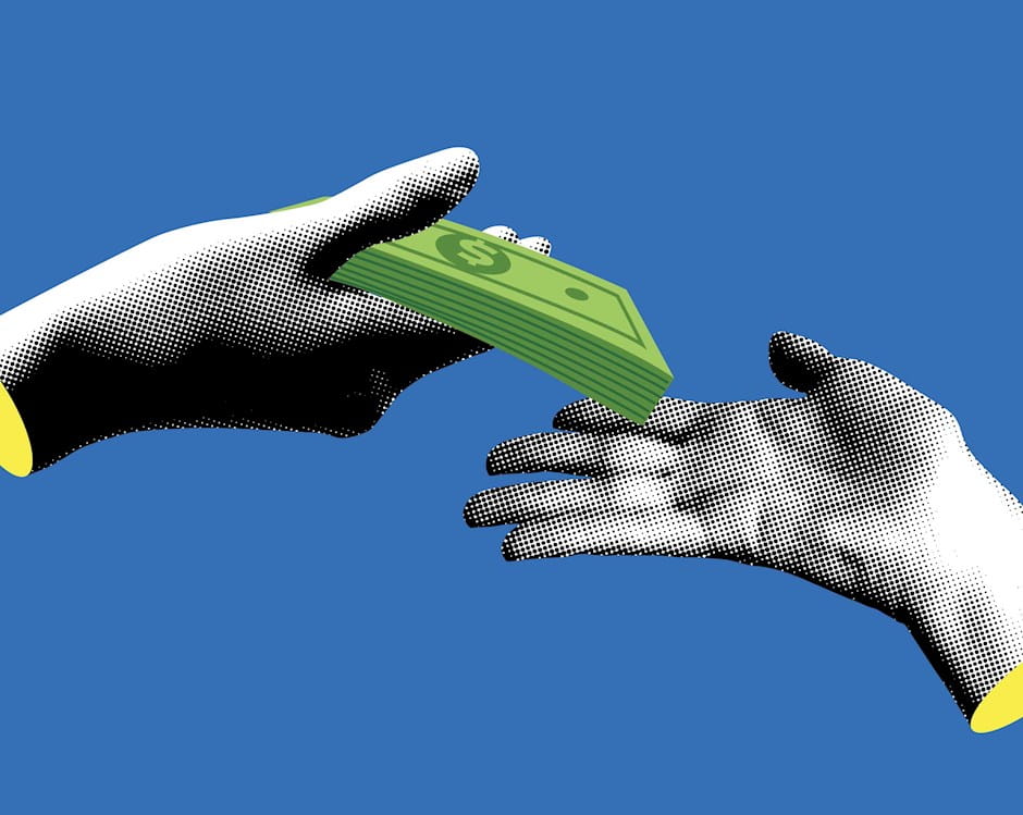One hand giving money to another