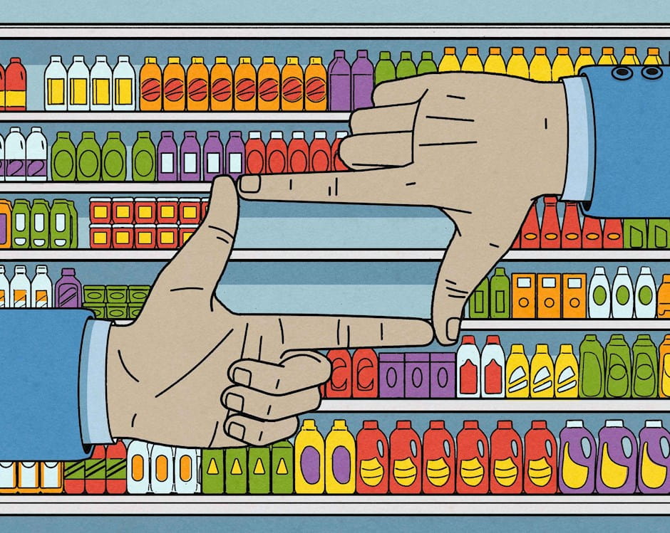 Hands framing empty space on grocery shelves