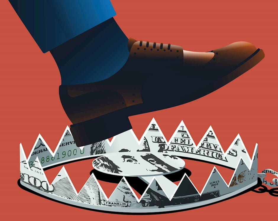 Foot stepping into bear trap made of dollars