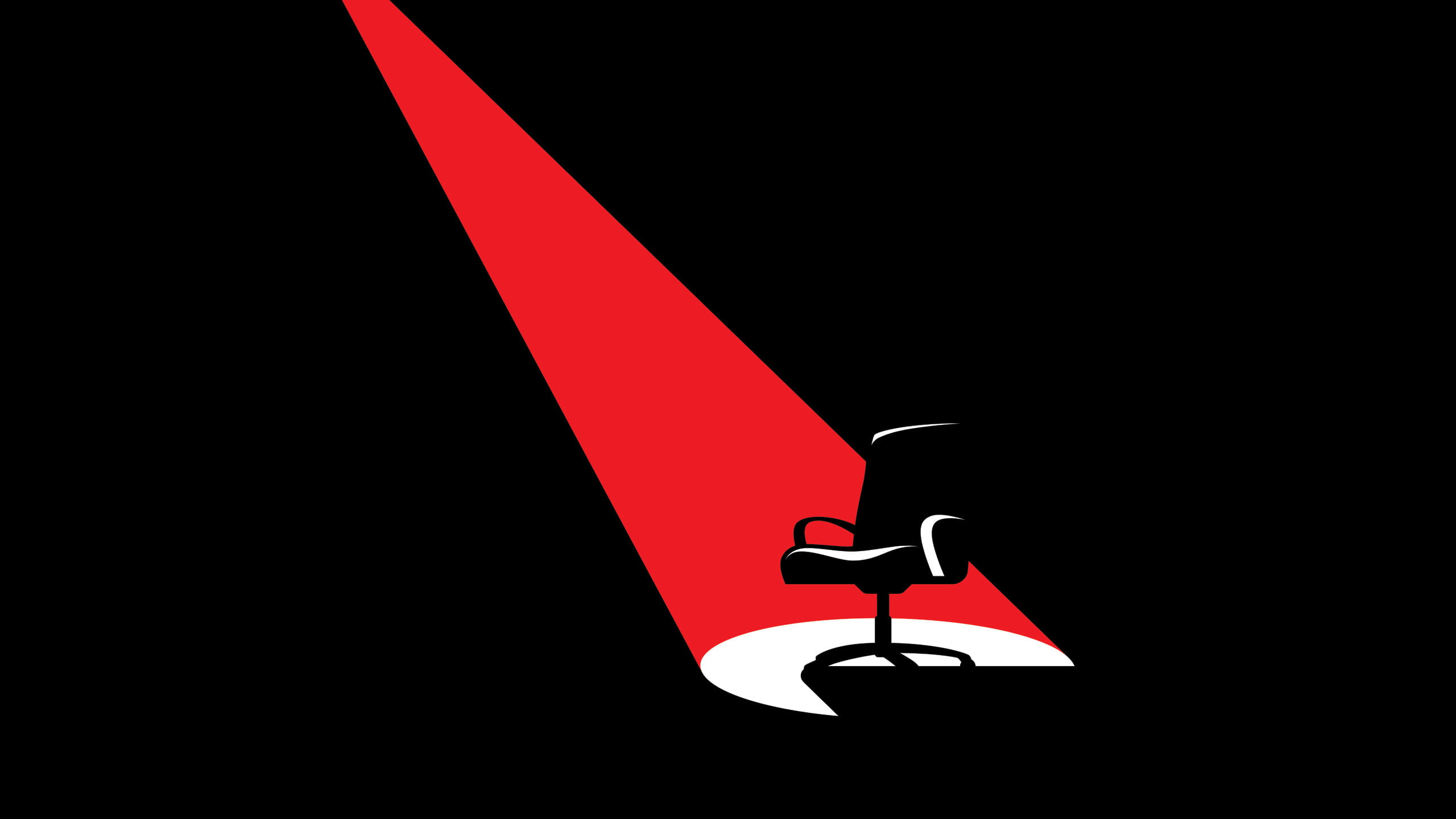 Office chair in spotlight