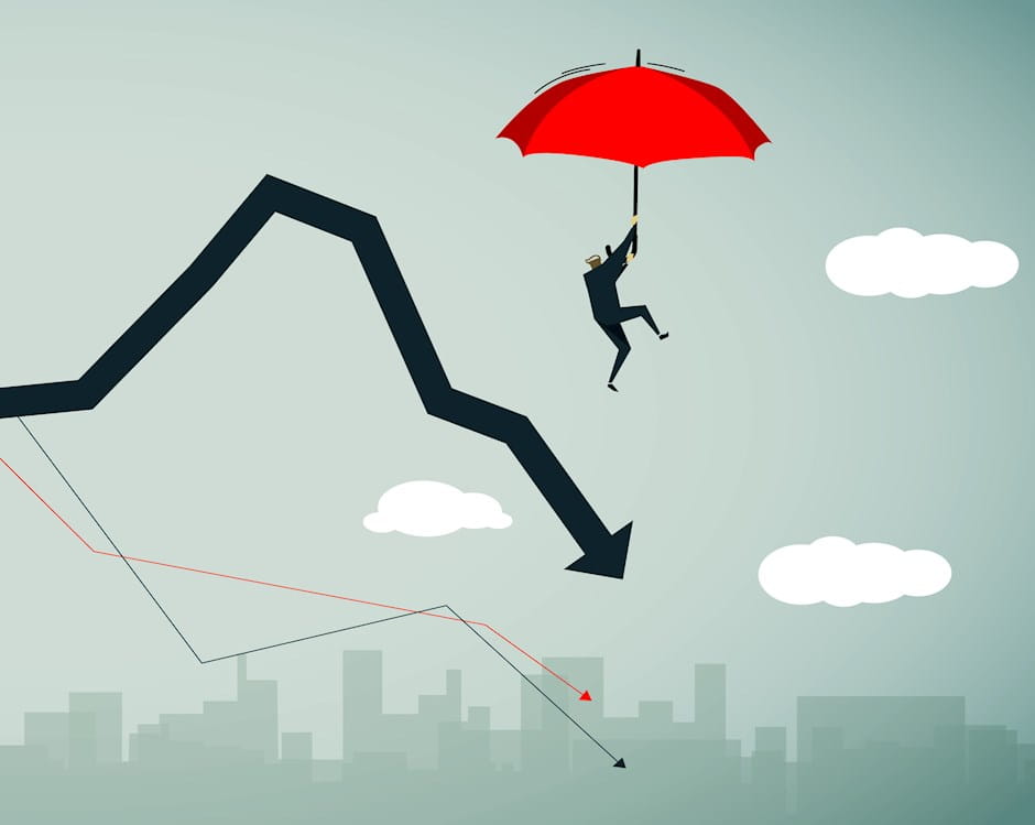 Man holidng an umbrella jumping off a downward line