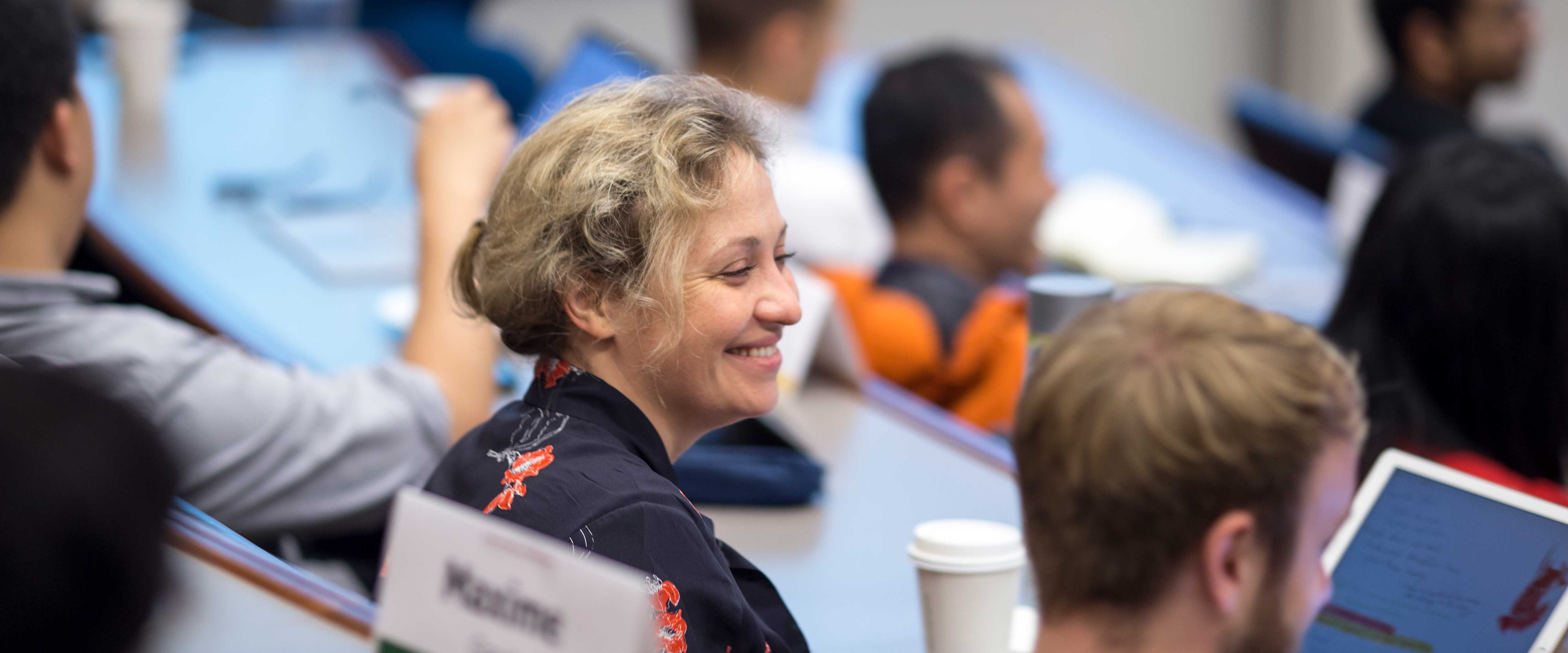 A woman in a EMBA classroom