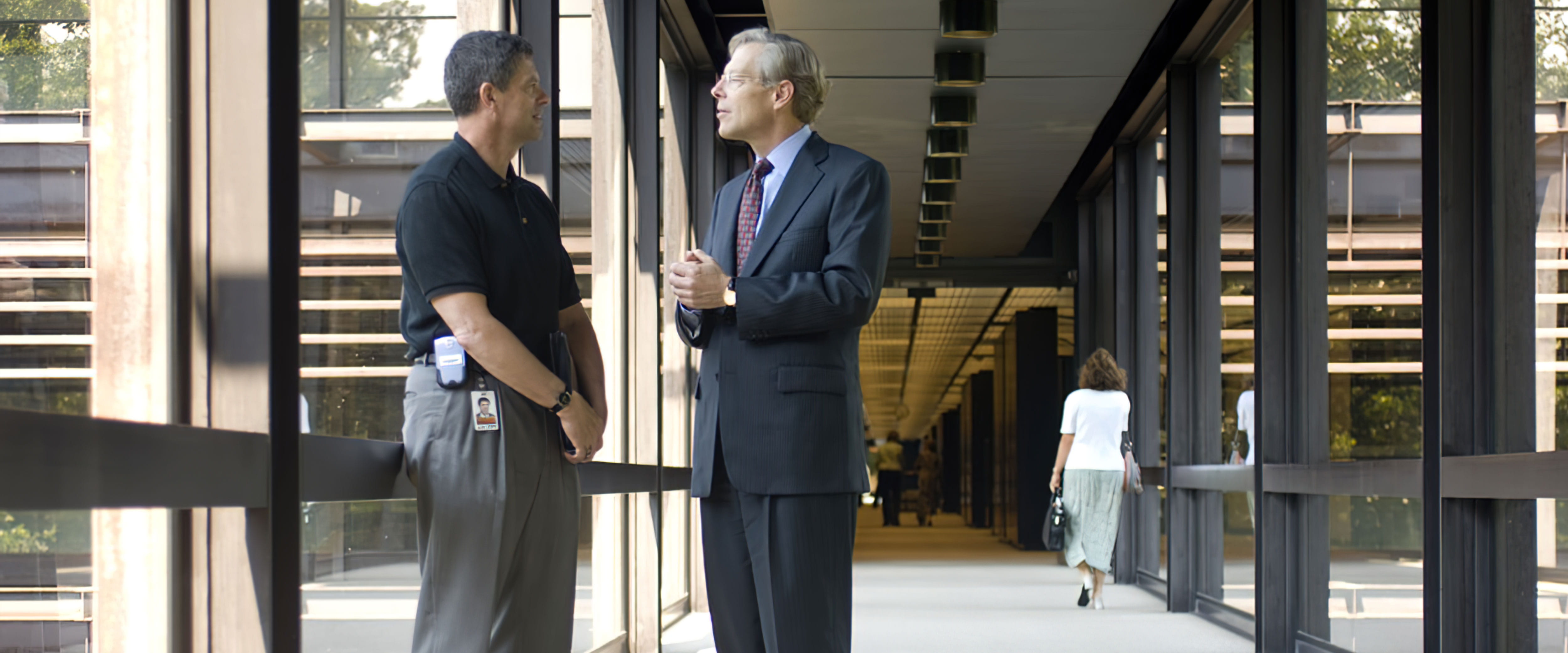 Robert W. Lane speaking with a man