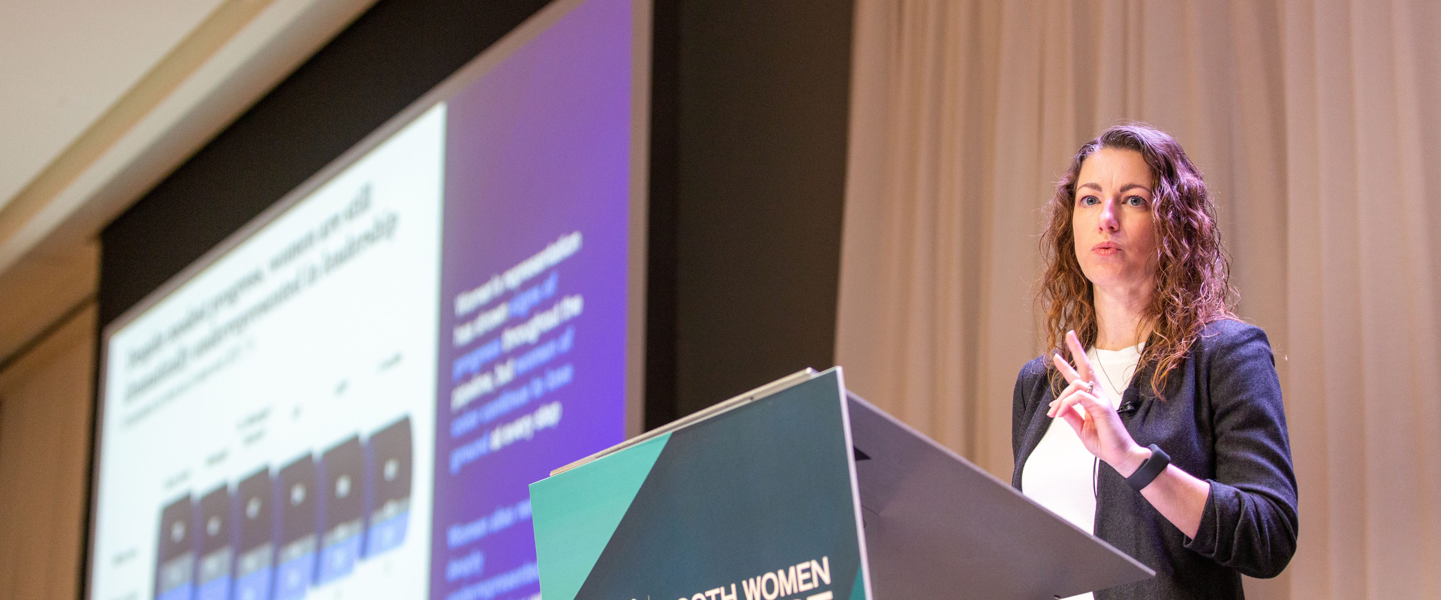 Karen Passmore presenting McKinsey's Women in the Workplace report at the Booth Women Connect Conference