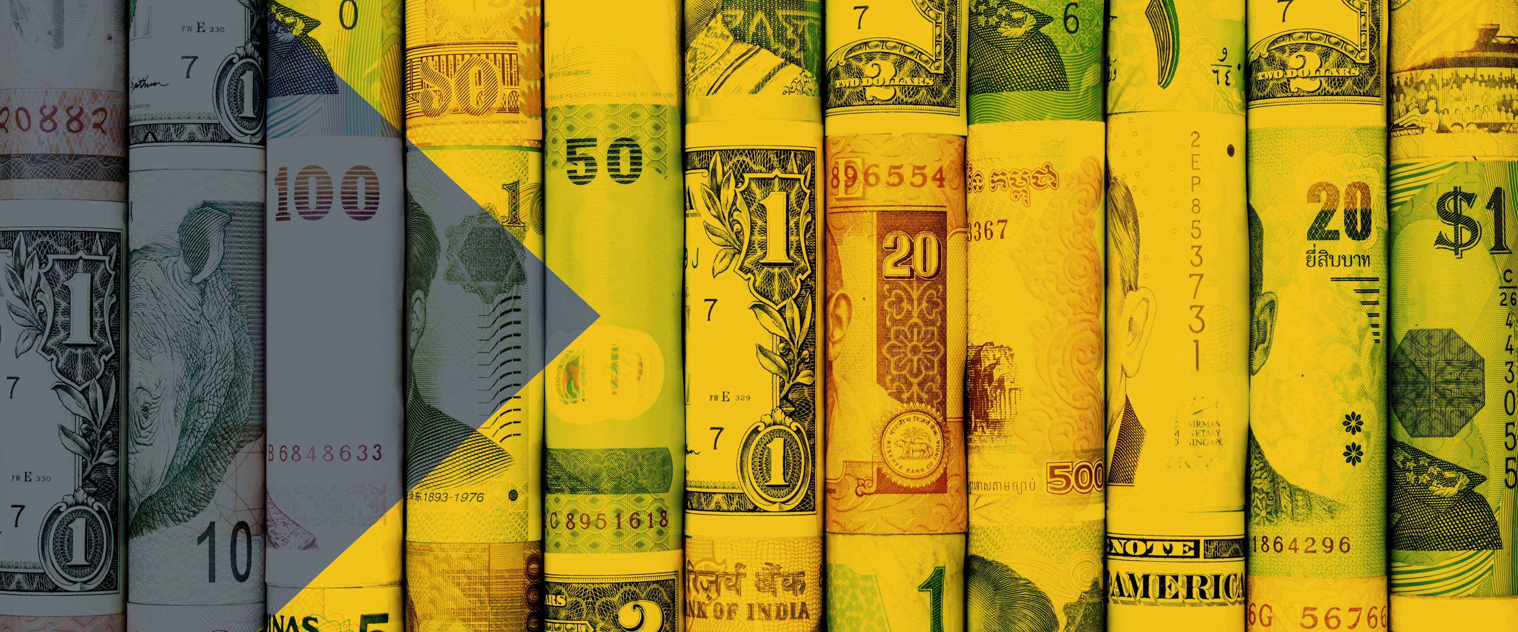 Different international currencies rolled up in a grid