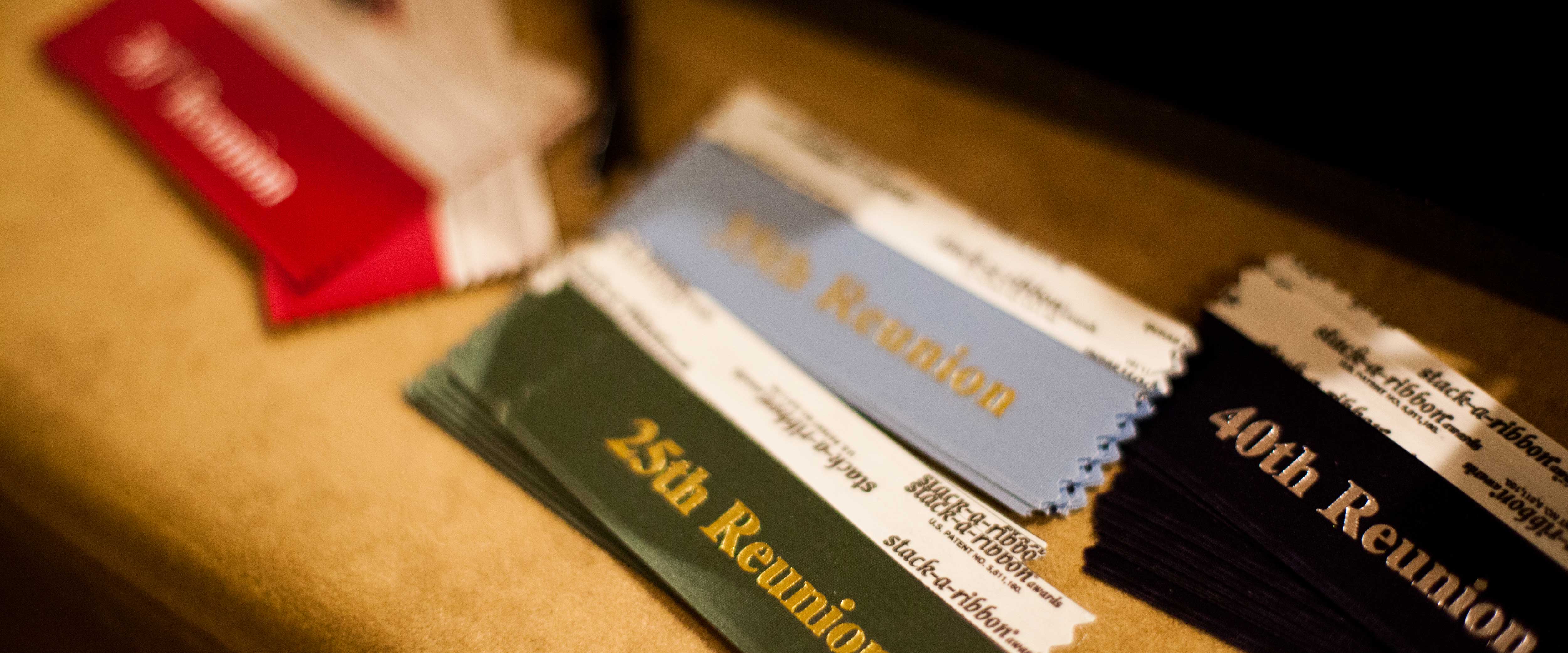 Reconnect name tags lined up for guests