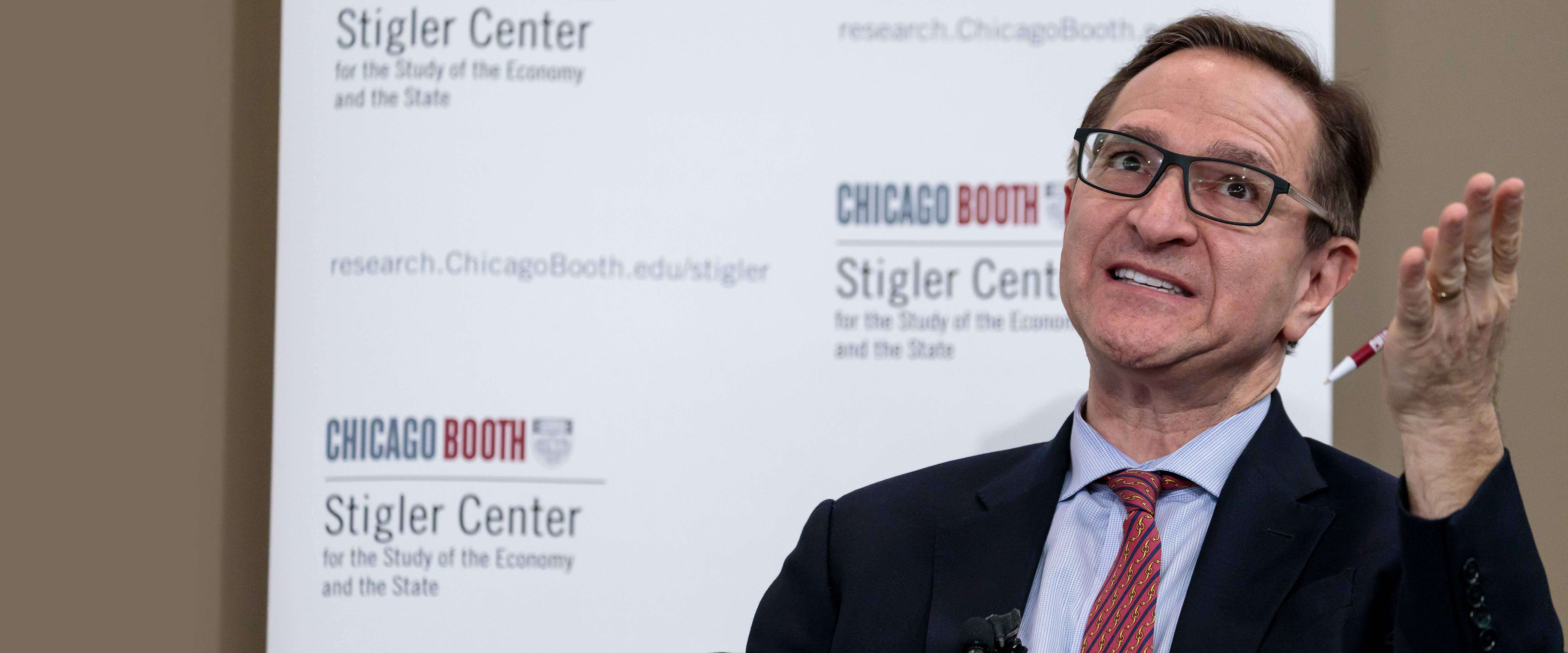 Steve Kaplan speaking at a Stigler Center event