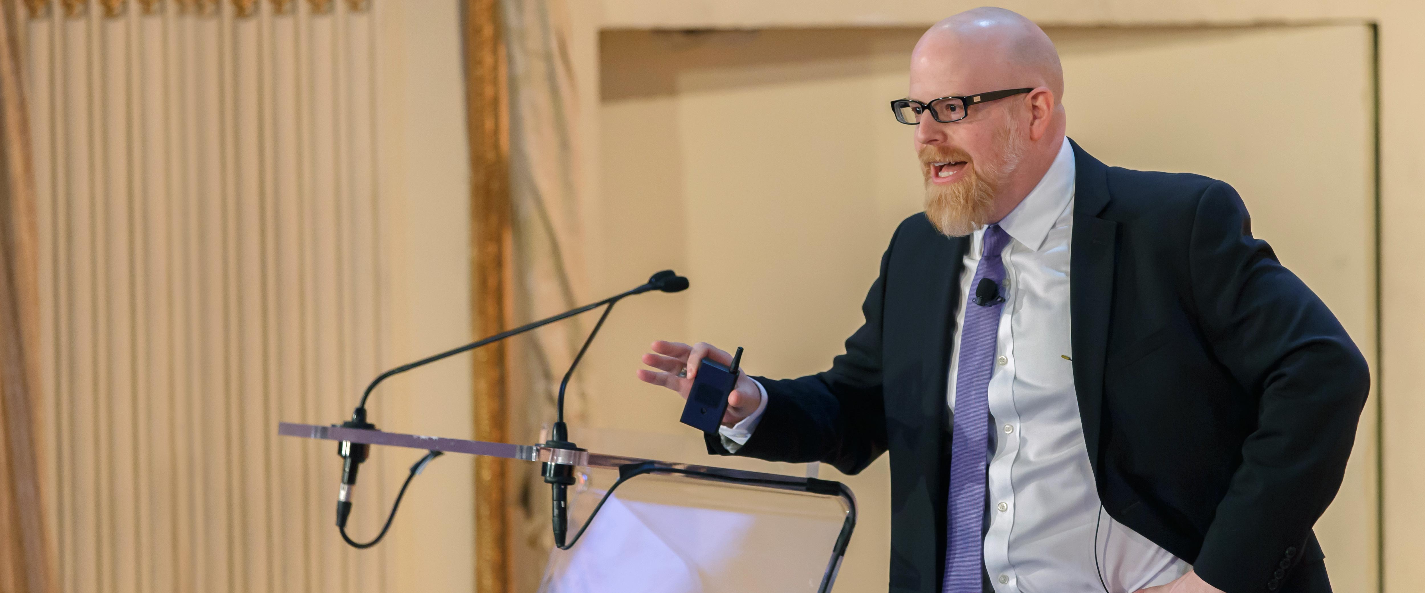 Erik Hurst speaking at Economic Outlook New York in February 2015