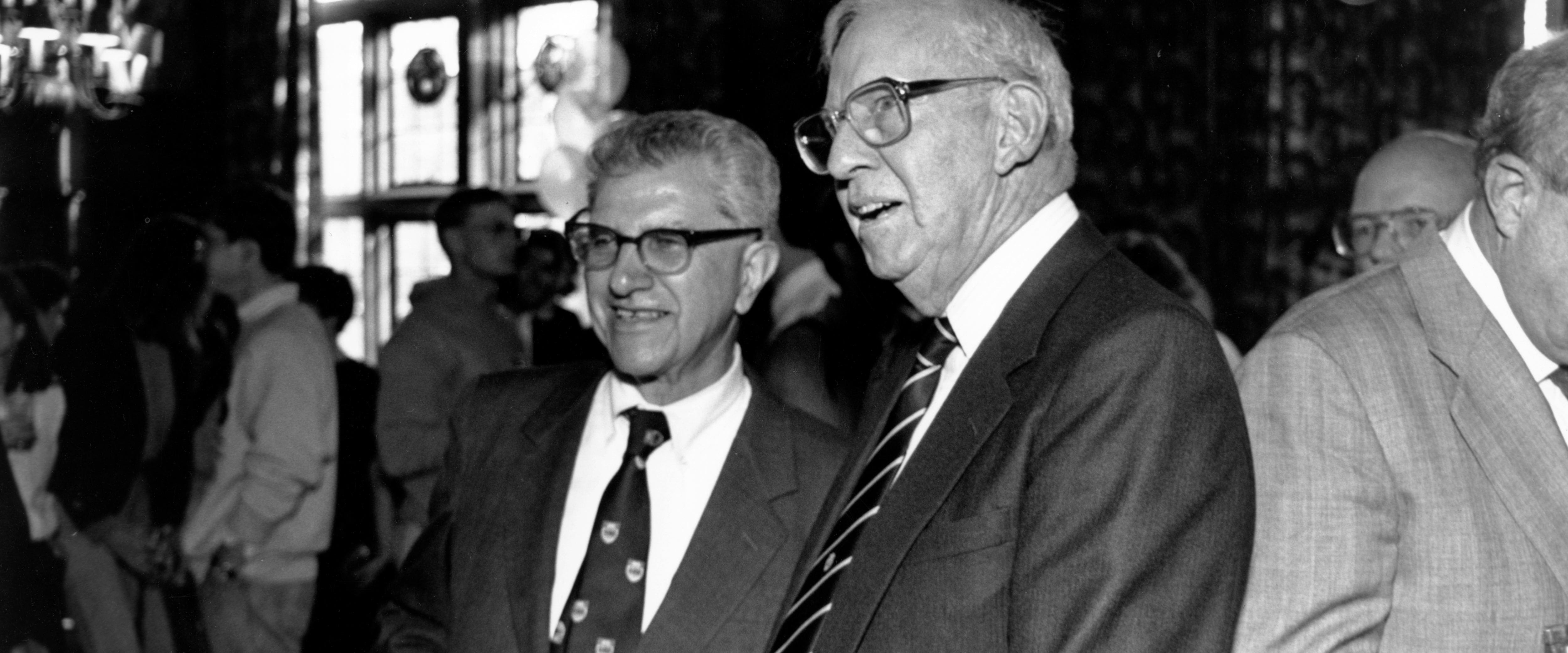 Merton Miller stands with George Stigler at Miller’s Nobel reception