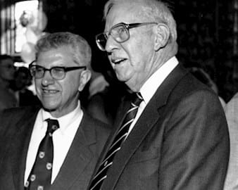 Merton Miller stands with George Stigler at Miller’s Nobel reception