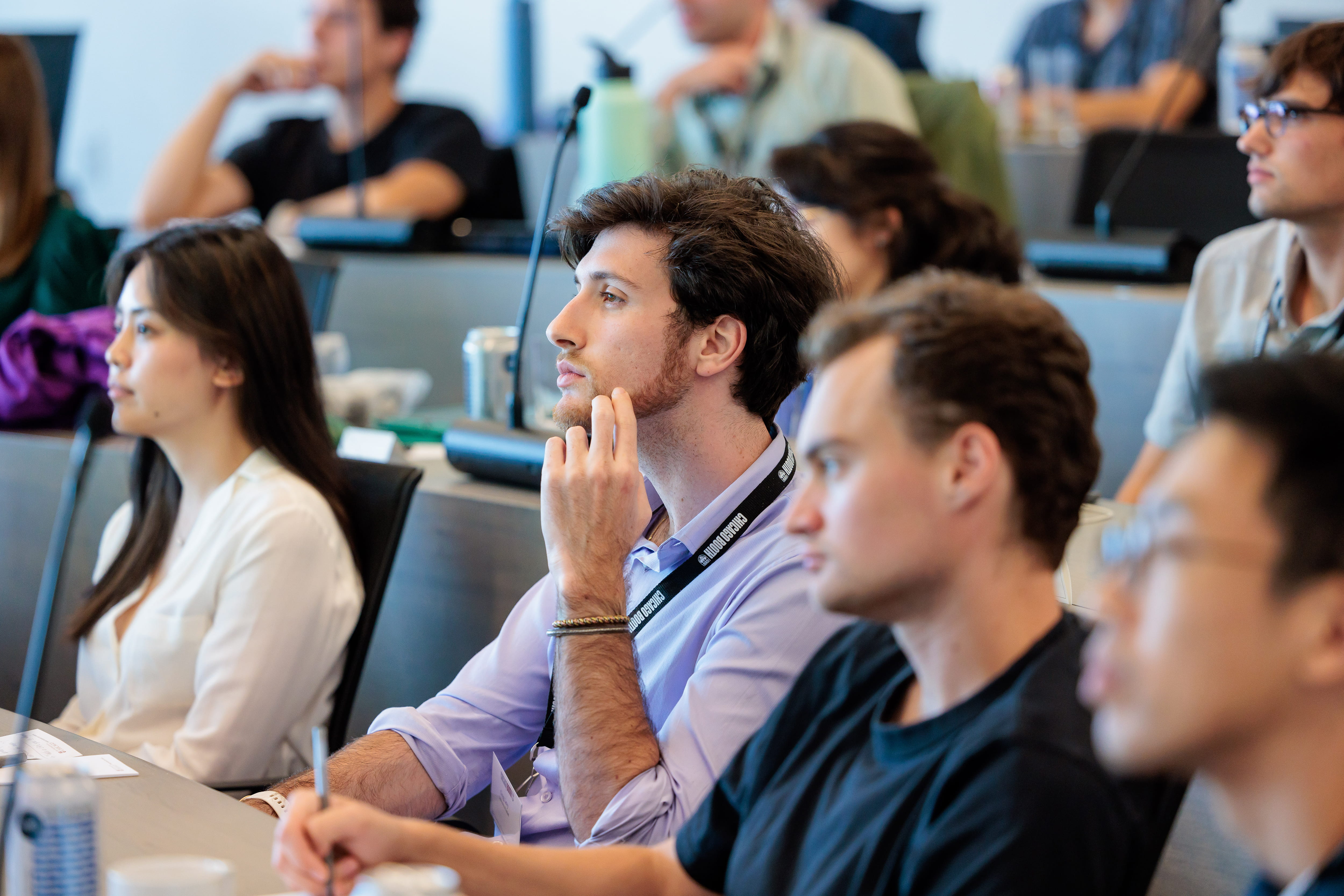 Students attentively watching a lecture.