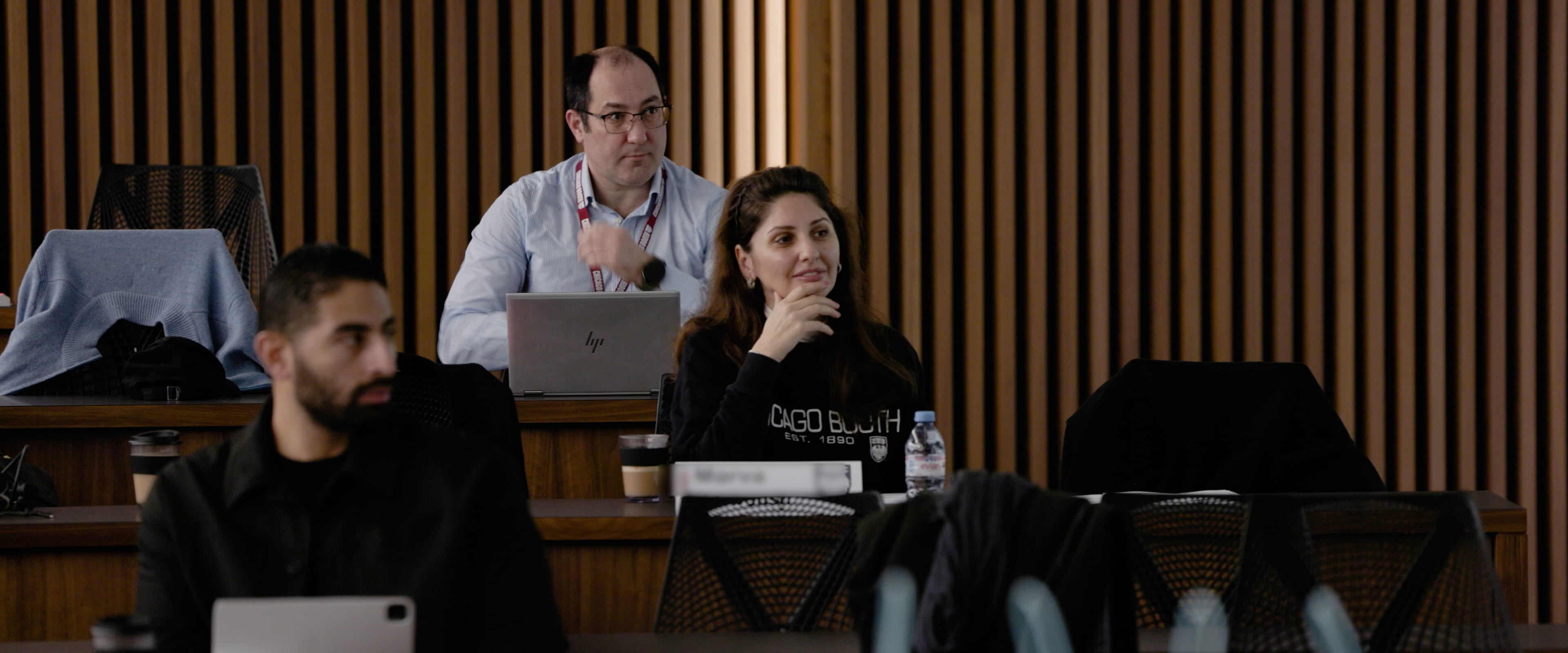 Three students in class.